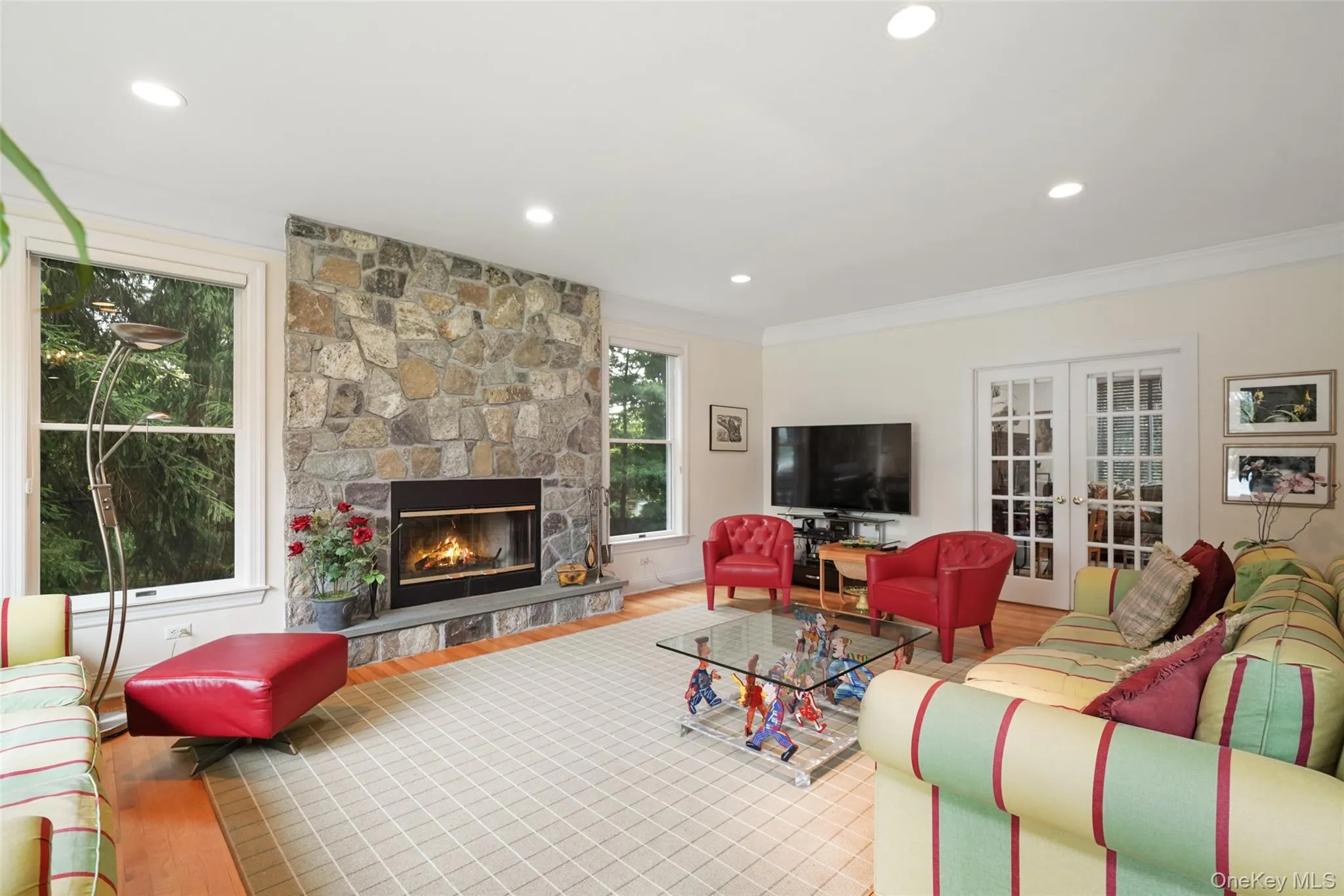 Living room with stone fireplace Living room with stone fireplace