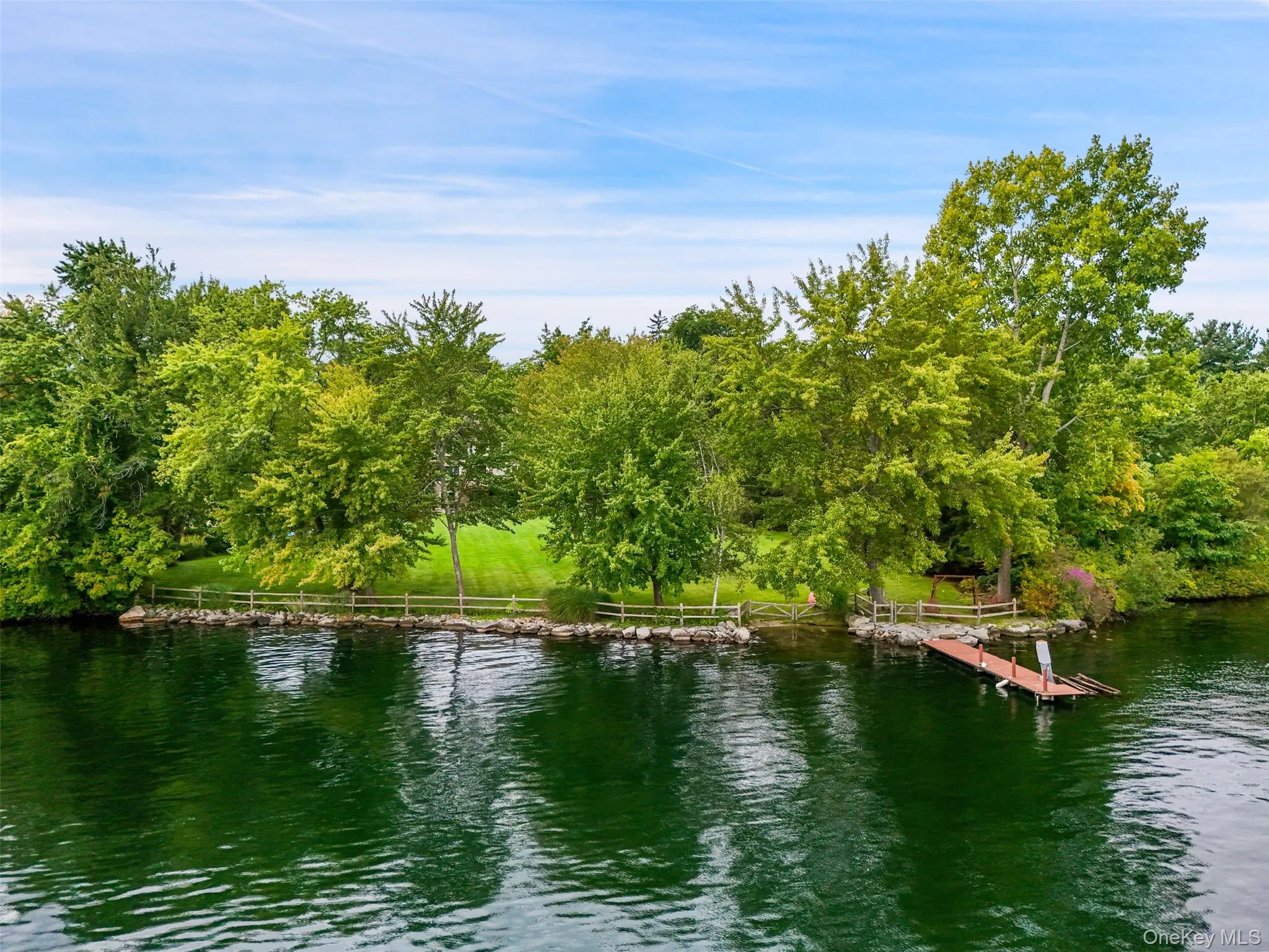 200 feet of prime waterfront with boat dock and sandy beach 200 feet of prime waterfront with boat dock and sandy beach