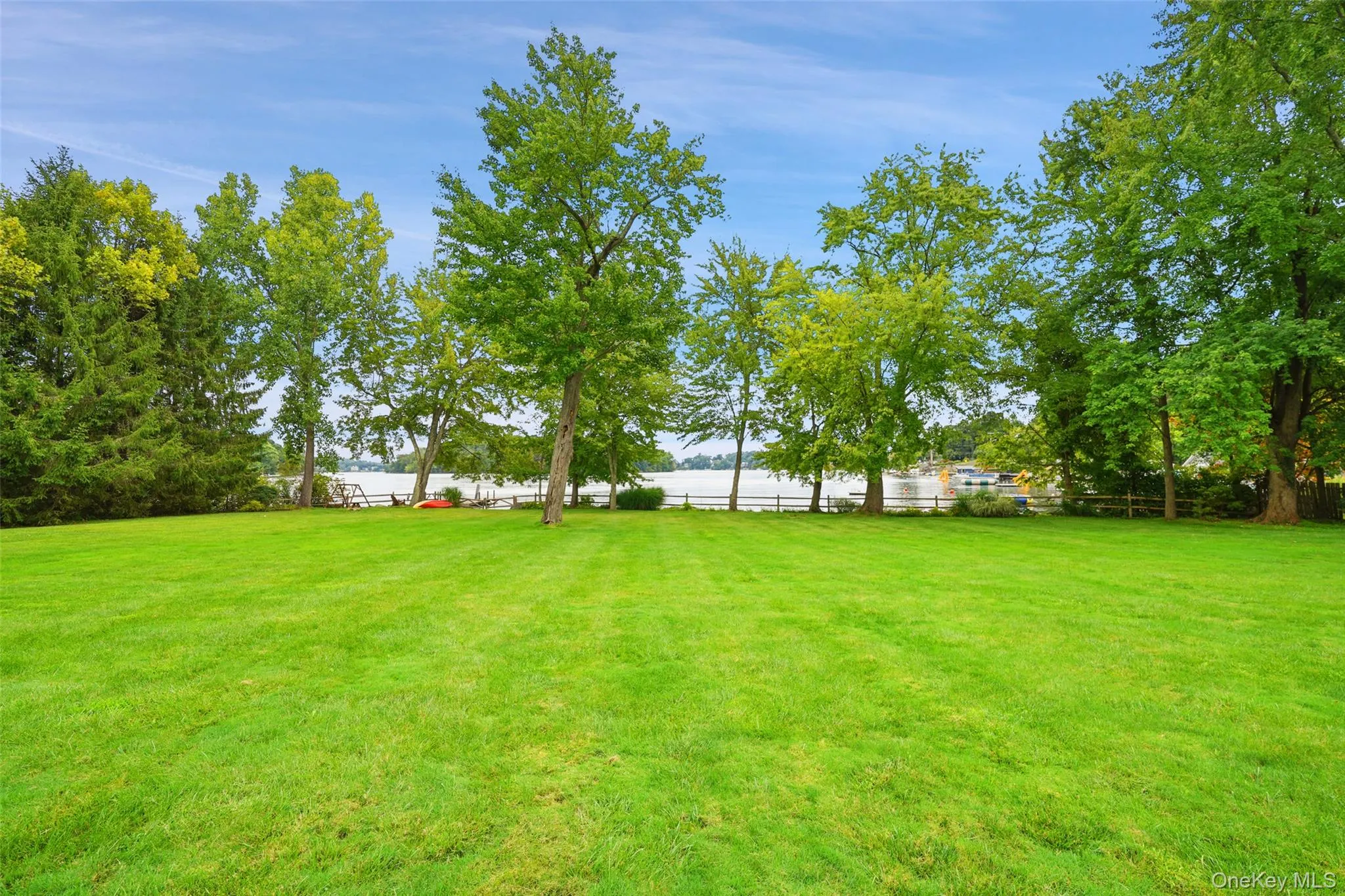 Perfectly level back yard with 200' waterfront Perfectly level back yard with 200' waterfront