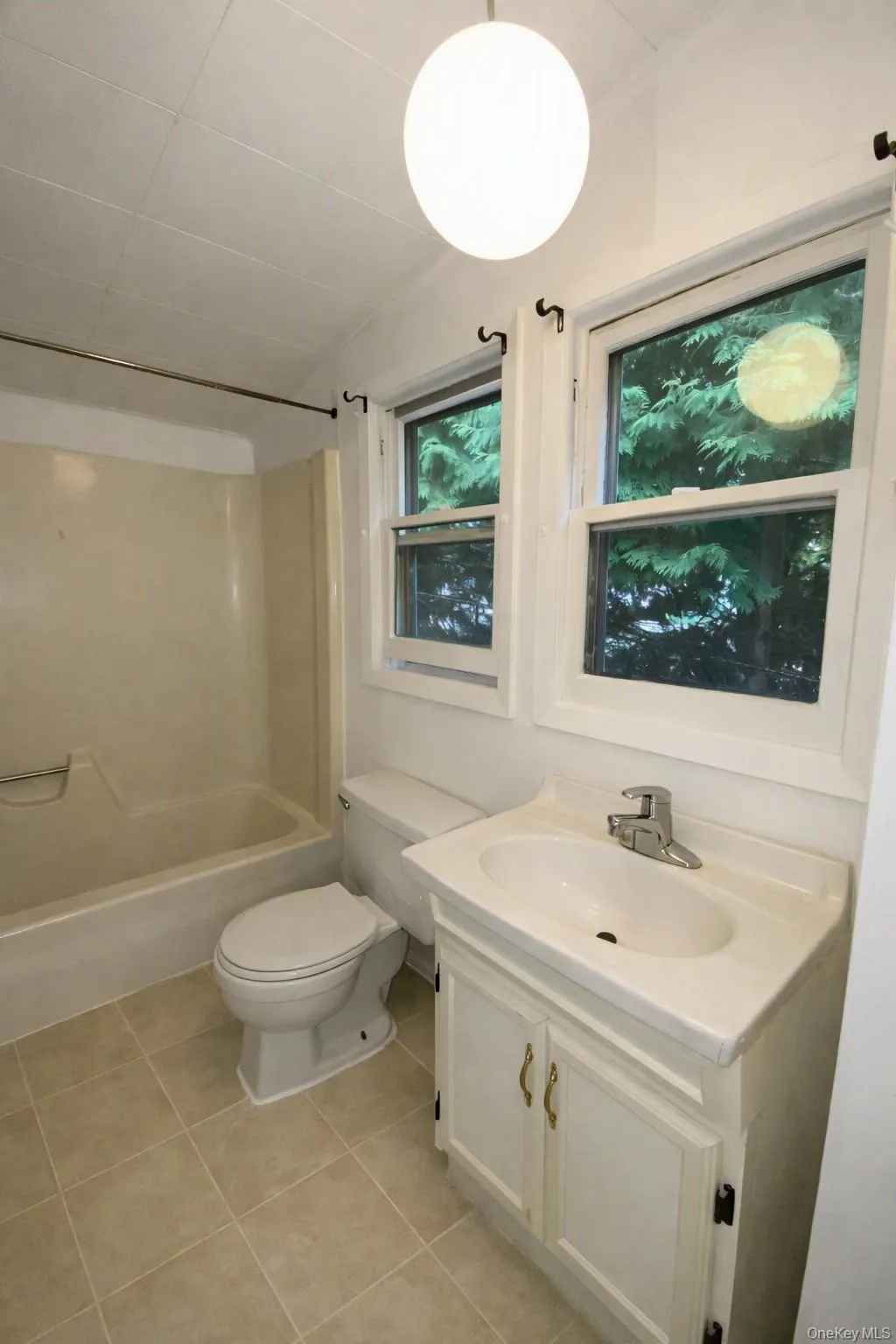 The updated bathroom features a shower/tub combination The updated bathroom features a shower/tub combination