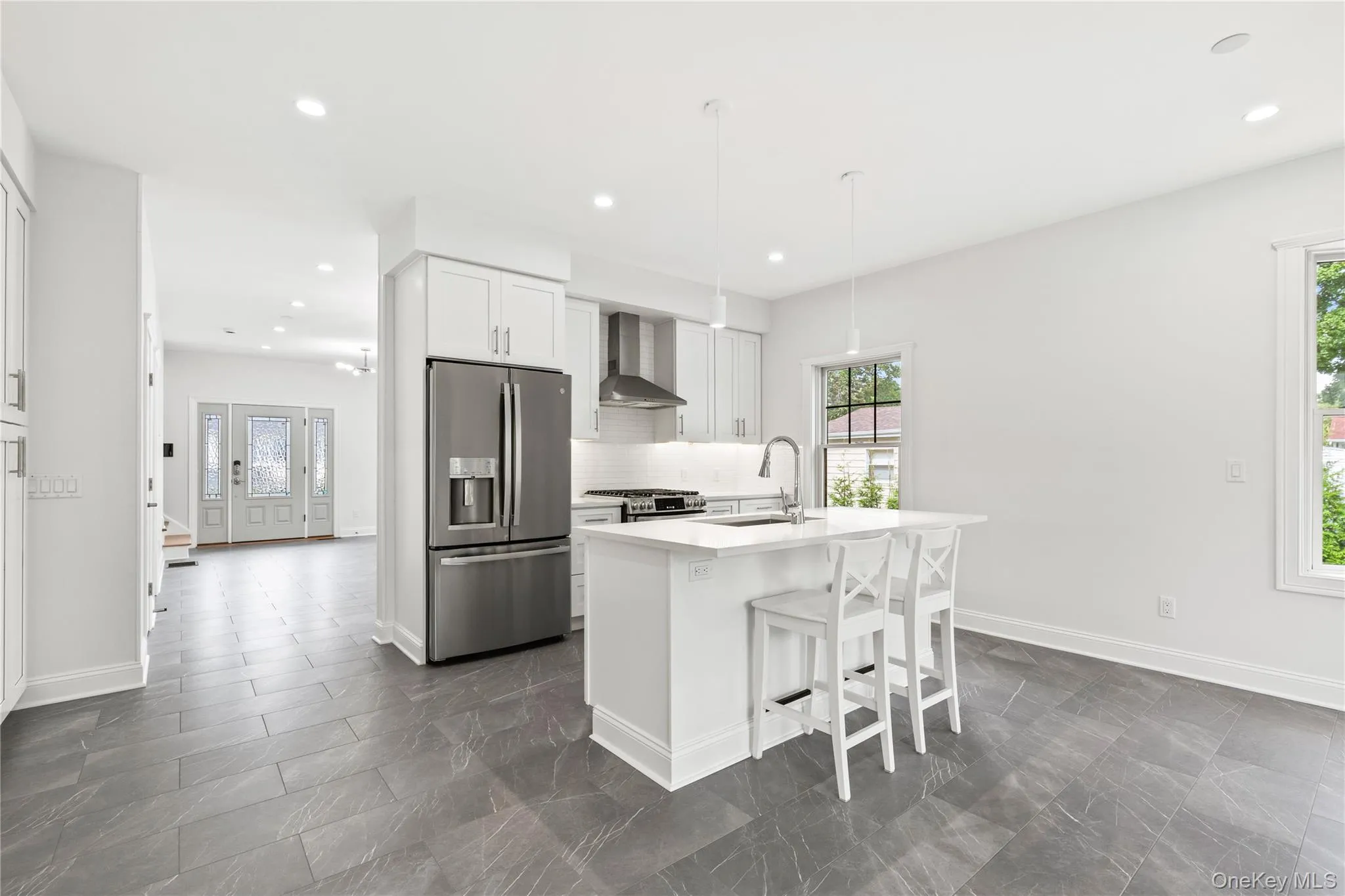 The Kitchen is sleek and modern with stainless steel appliances, lots of cabinet storage and plenty of counter space. The Kitchen is sleek and modern with stainless steel appliances, lots of cabinet storage and plenty of counter space.
