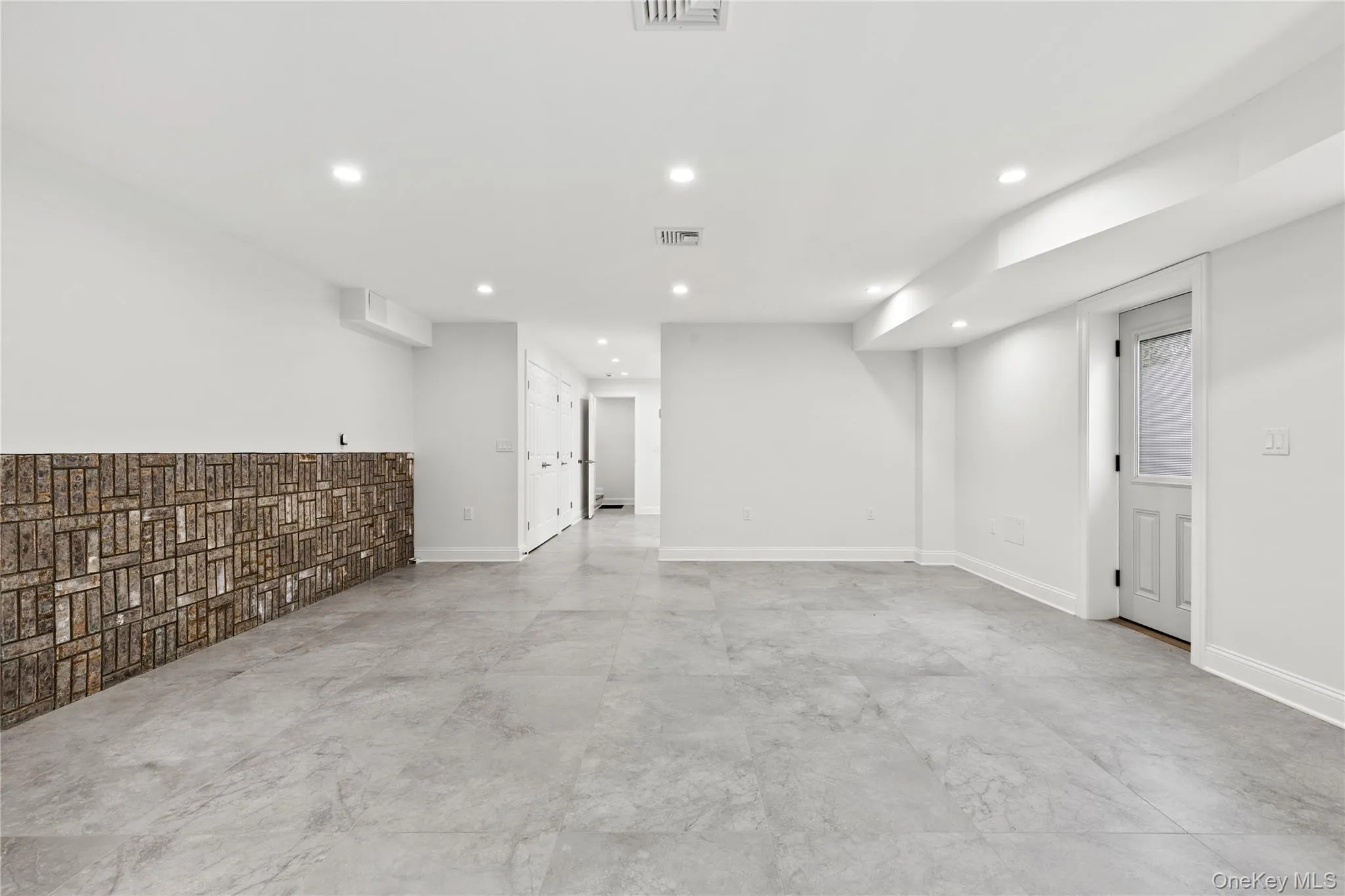 The Lower Level rec room is large and offers flexible use options depending on lifestyle needs. The Lower Level rec room is large and offers flexible use options depending on lifestyle needs.