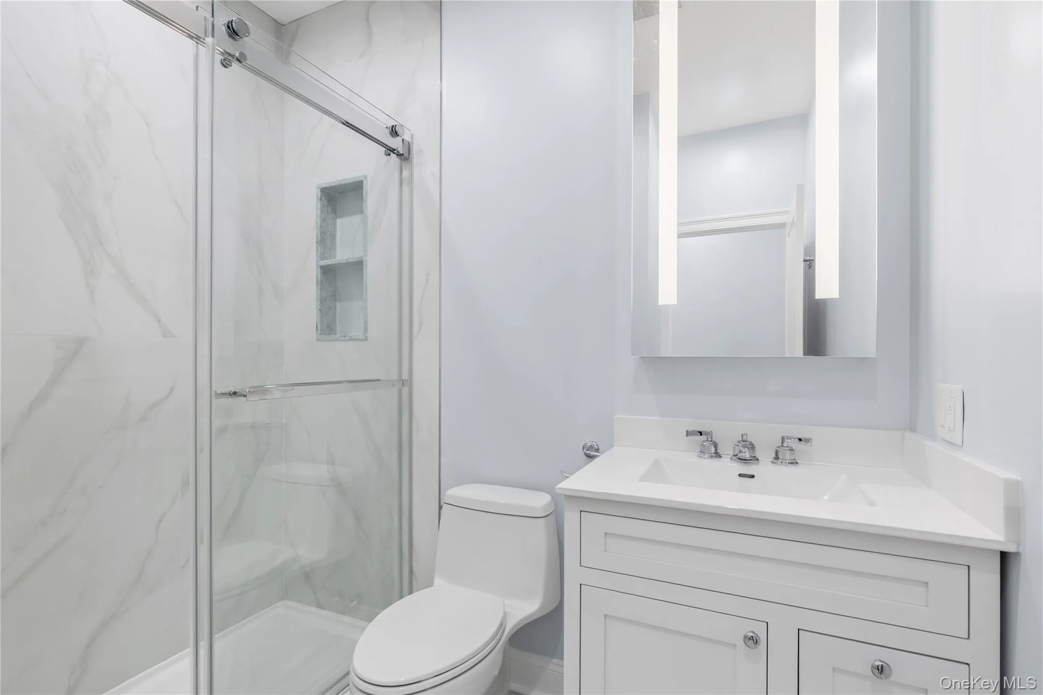 The shared Hall Bathroom is elevated and functional. The shared Hall Bathroom is elevated and functional.