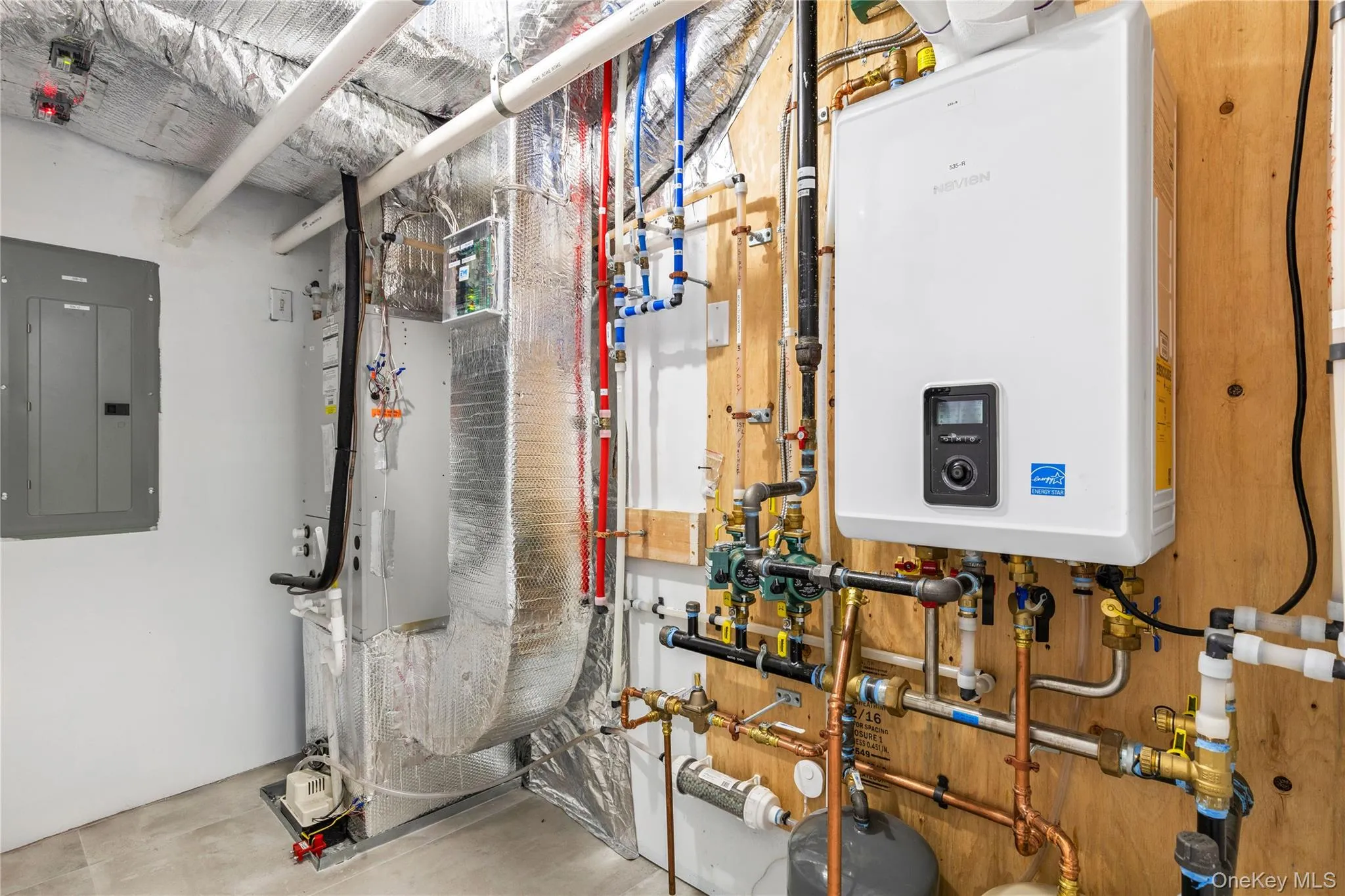 The utility room demonstrates the care and precision that has gone into the construction of this property from continuous hot water to zoned HVAC, to sound systems to high connectivity. The utility room demonstrates the care and precision that has gone into the construction of this property from continuous hot water to zoned HVAC, to sound systems to high connectivity.