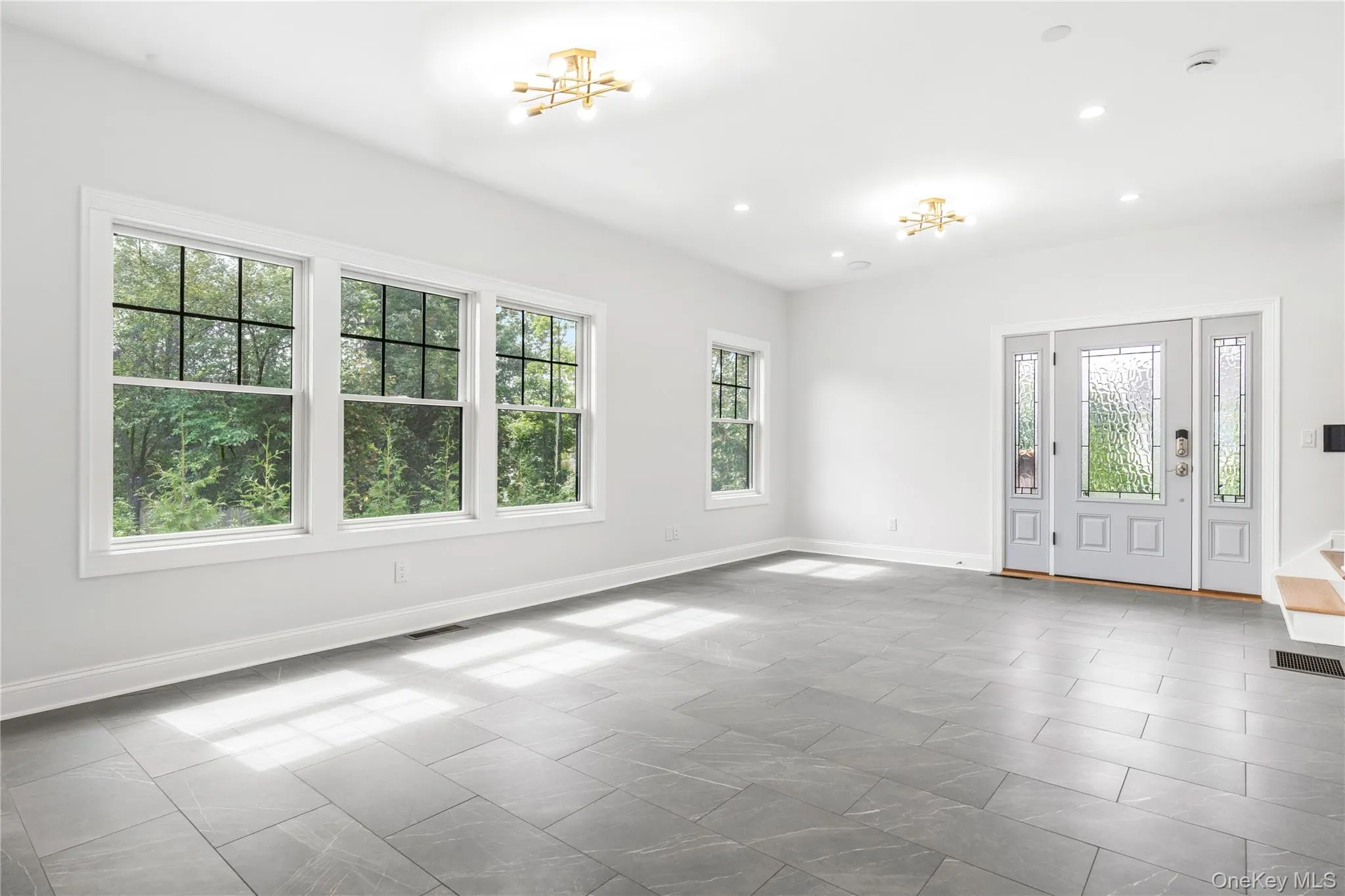 Living Room/Dining Room with large, double paned windows for maximum natural light. Living Room/Dining Room with large, double paned windows for maximum natural light.