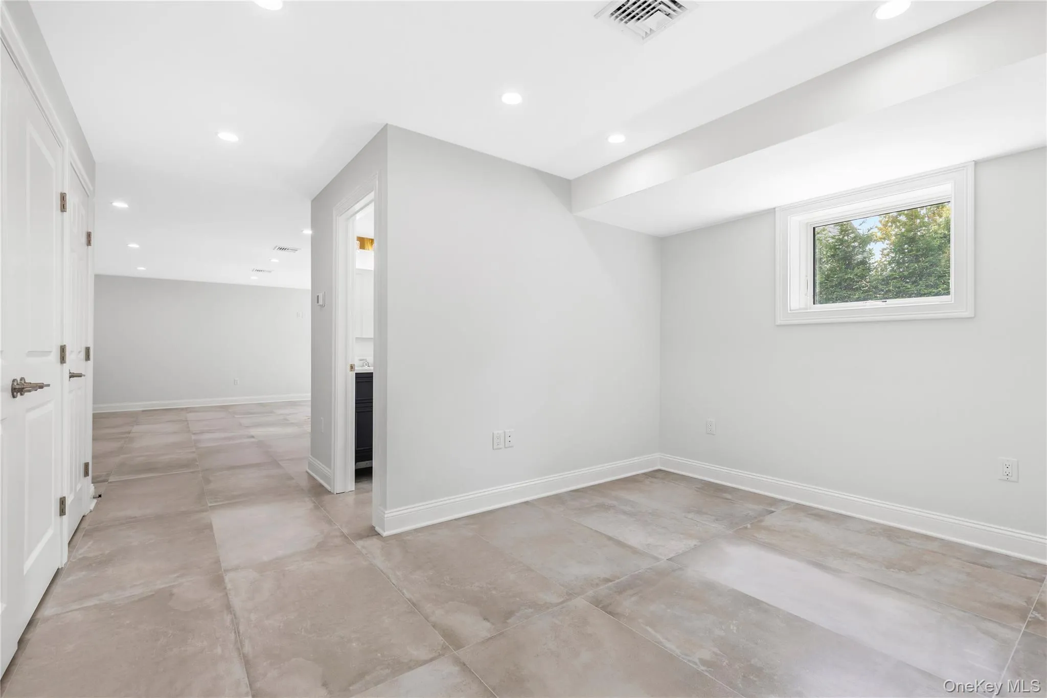 The first Lower Level space functions perfectly as a WFH space or suits extra storage. The first Lower Level space functions perfectly as a WFH space or suits extra storage.