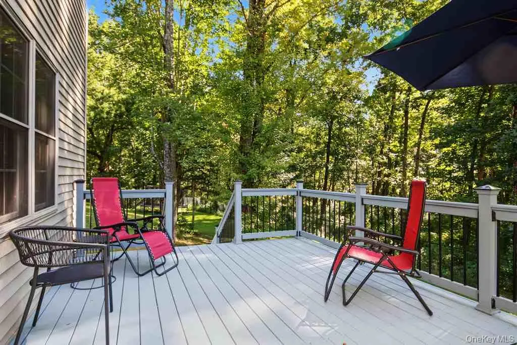 with stairs down to the backyard with stairs down to the backyard