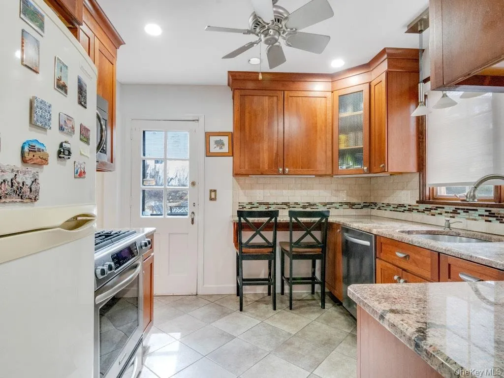 Renovated Kitchen with Granite Counters Renovated Kitchen with Granite Counters