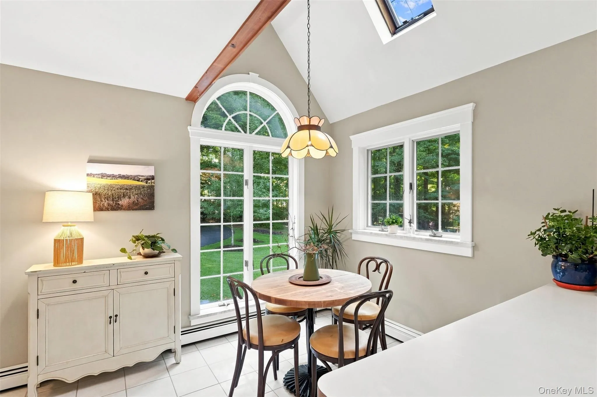 Breakfast area with arched window Breakfast area with arched window