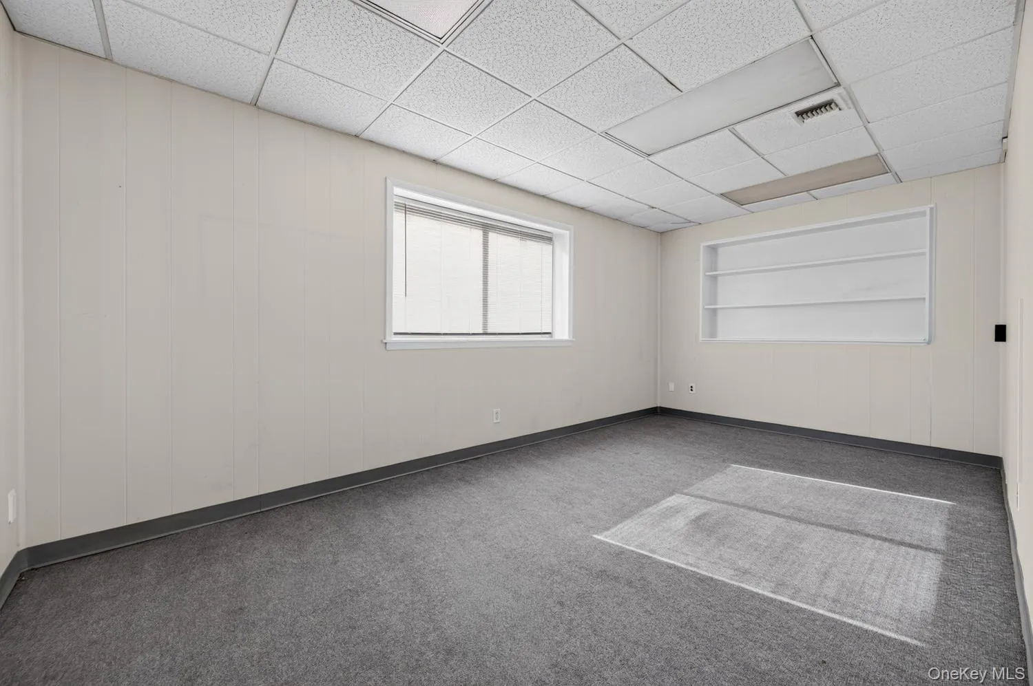 Private Office windows facing side of building Private Office windows facing side of building