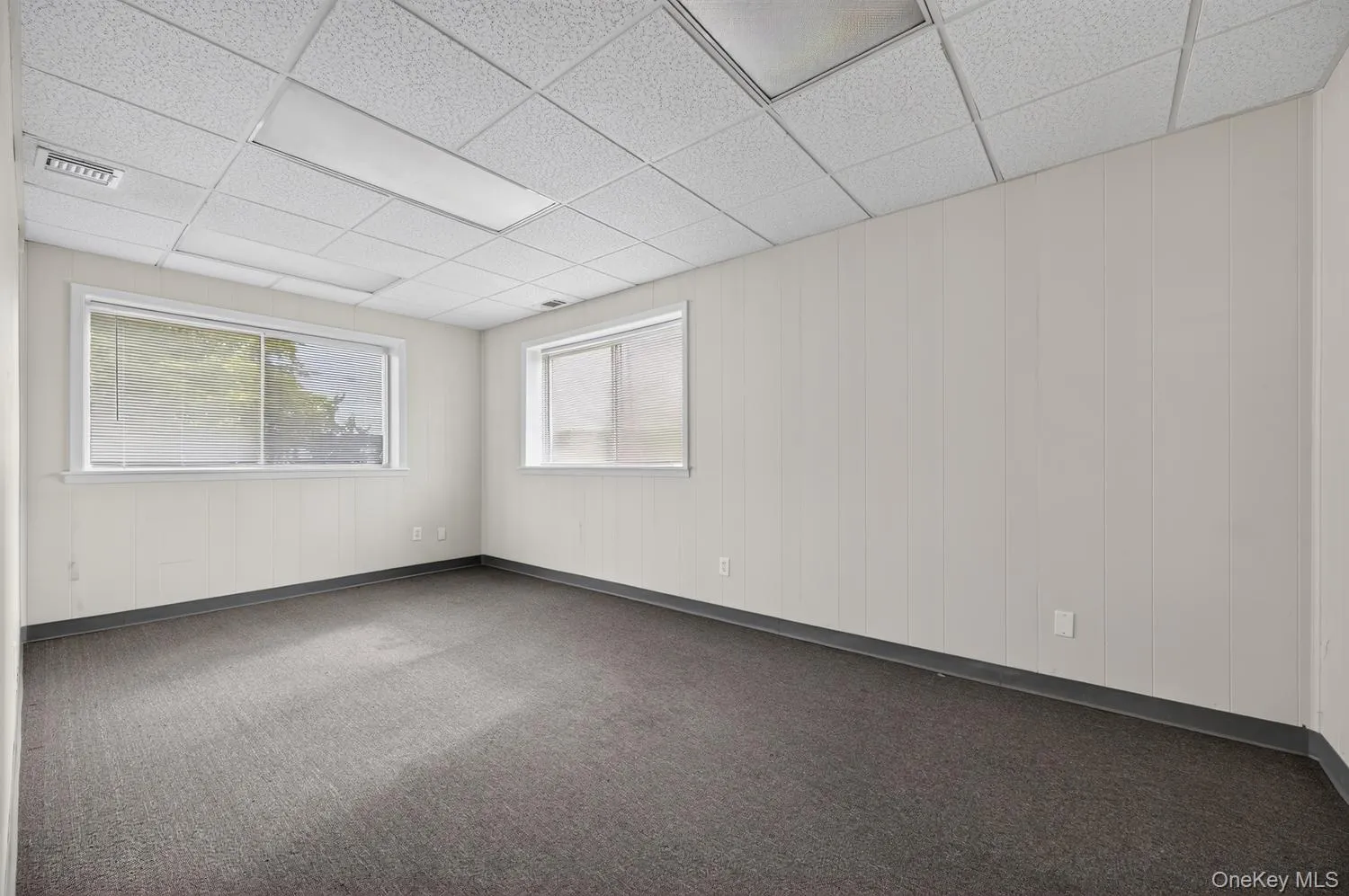 Private Office facing Front of building with large picture window and side window Private Office facing Front of building with large picture window and side window