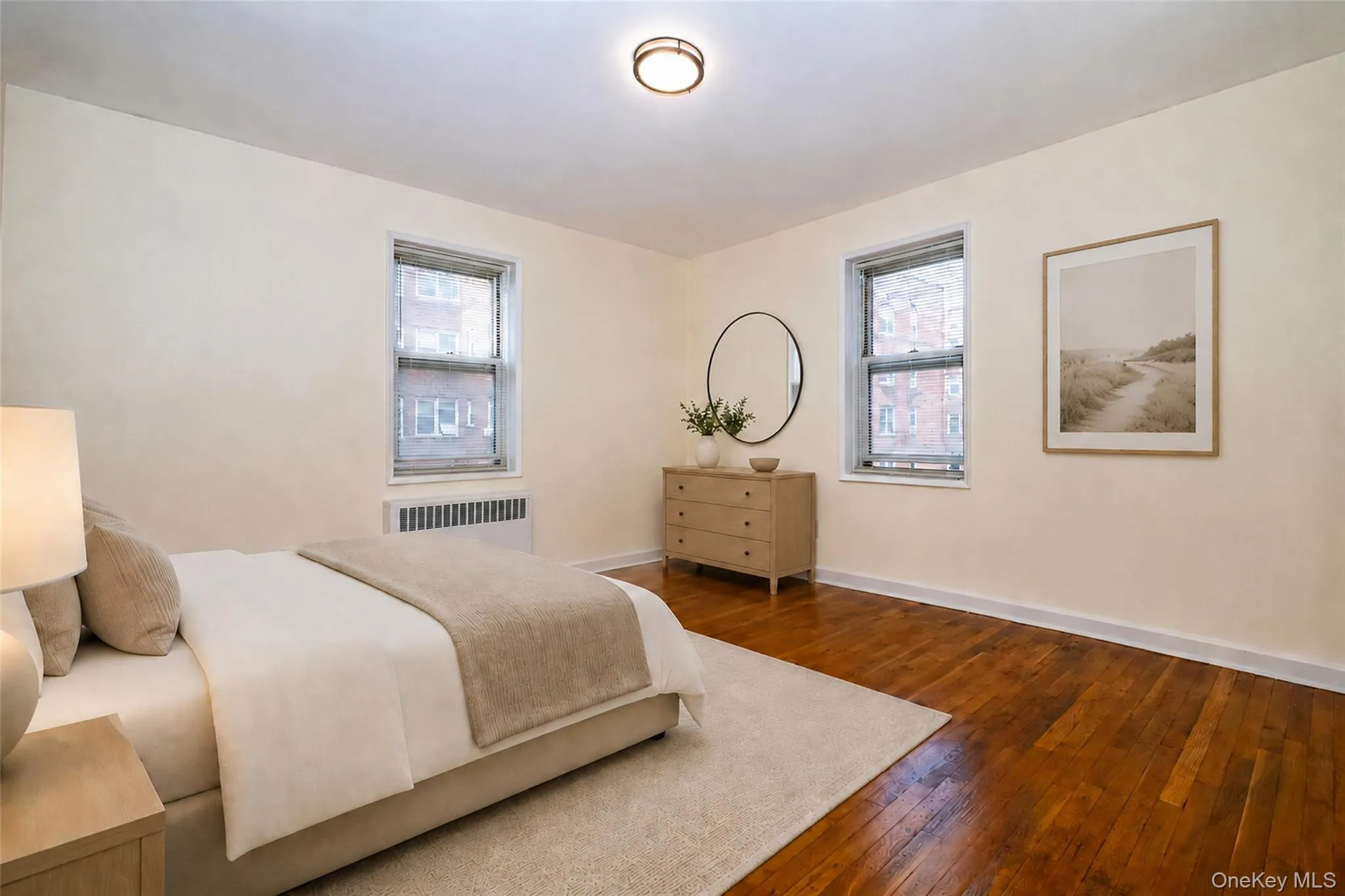 Bright and sunny bedroom with large windows**all interior photos virtually staged Bright and sunny bedroom with large windows**all interior photos virtually staged