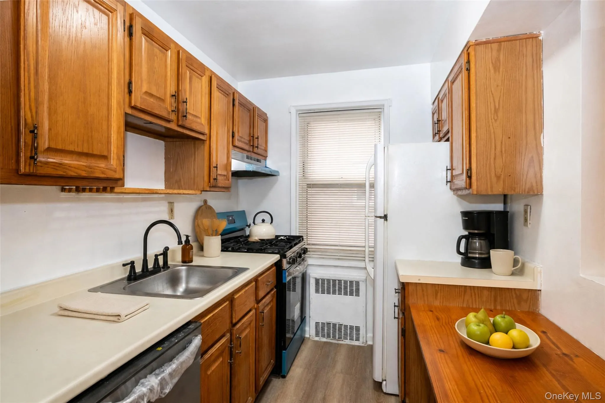 Updated kitchen with new dishwasher and stove Updated kitchen with new dishwasher and stove