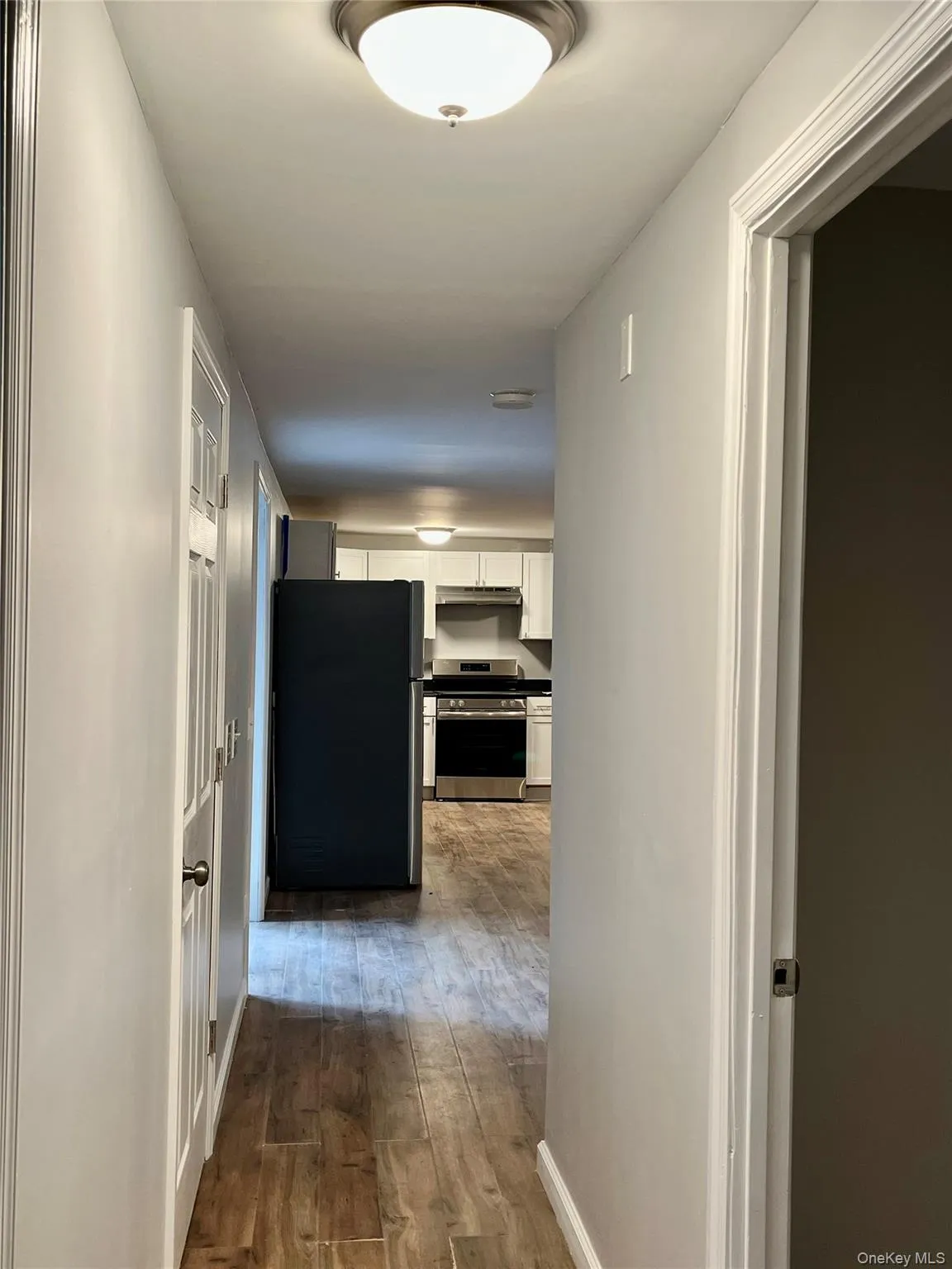 Hallway to laundry and Primary bedroom Hallway to laundry and Primary bedroom