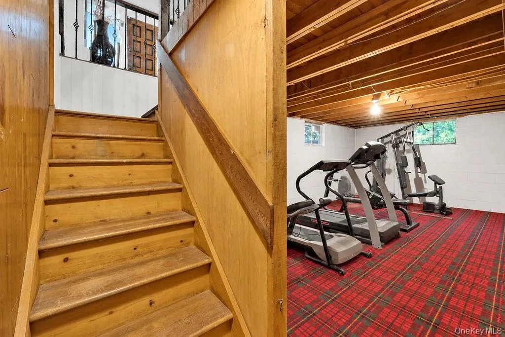 Basement Accessible from Living Room and Garage Basement Accessible from Living Room and Garage