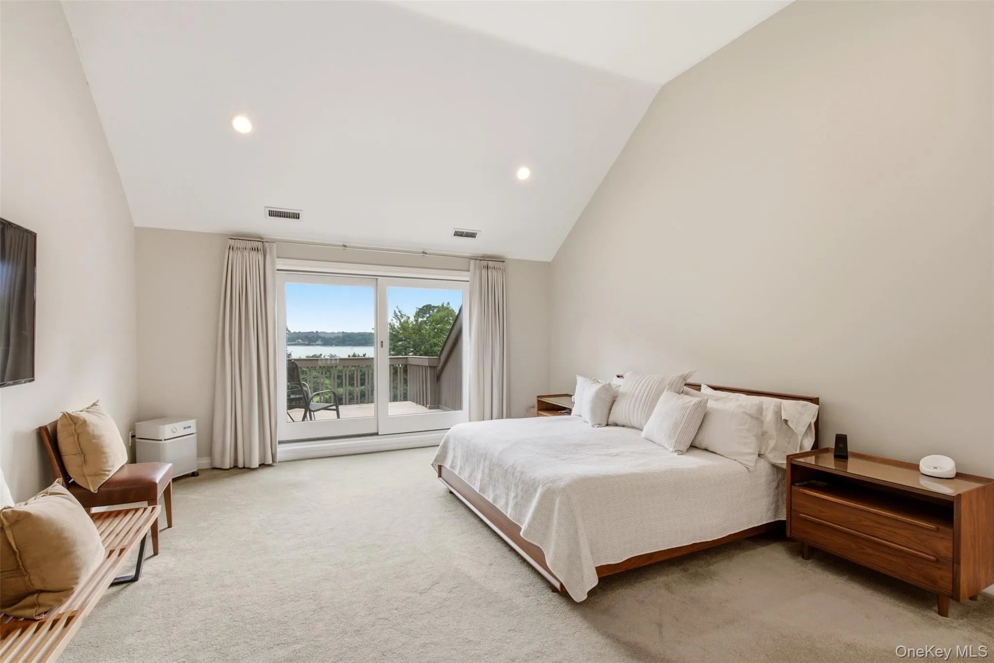 Spacious Primary Bedroom W/ Balcony W Waterviews Spacious Primary Bedroom W/ Balcony W Waterviews
