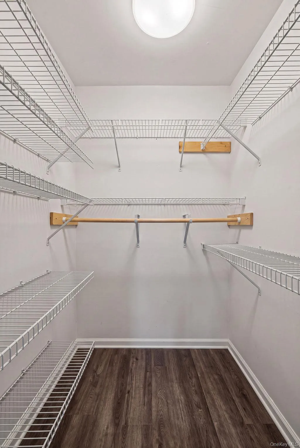 Primary Walk-In Closet Primary Walk-In Closet