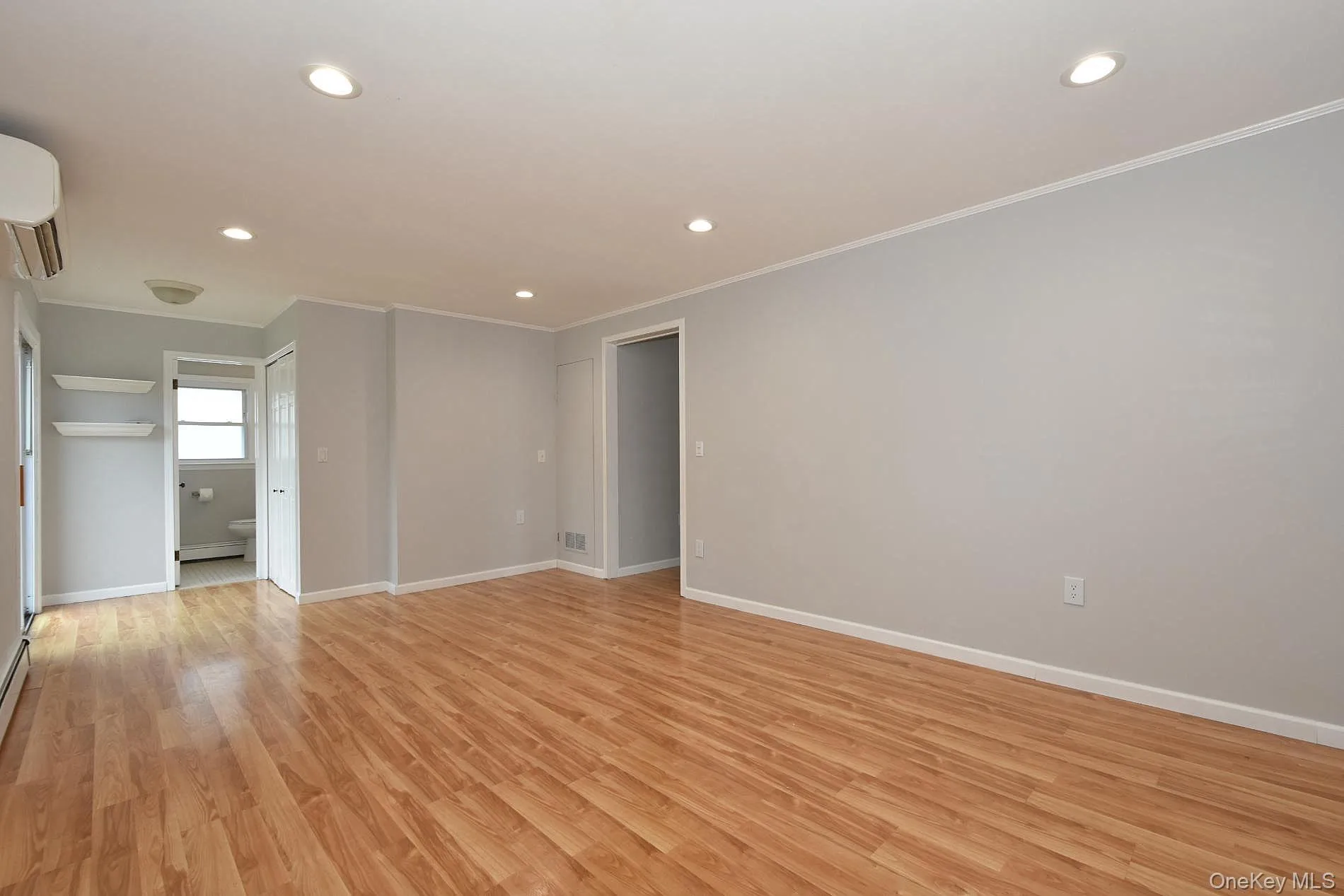 Den with recessed lighting and half bath Den with recessed lighting and half bath
