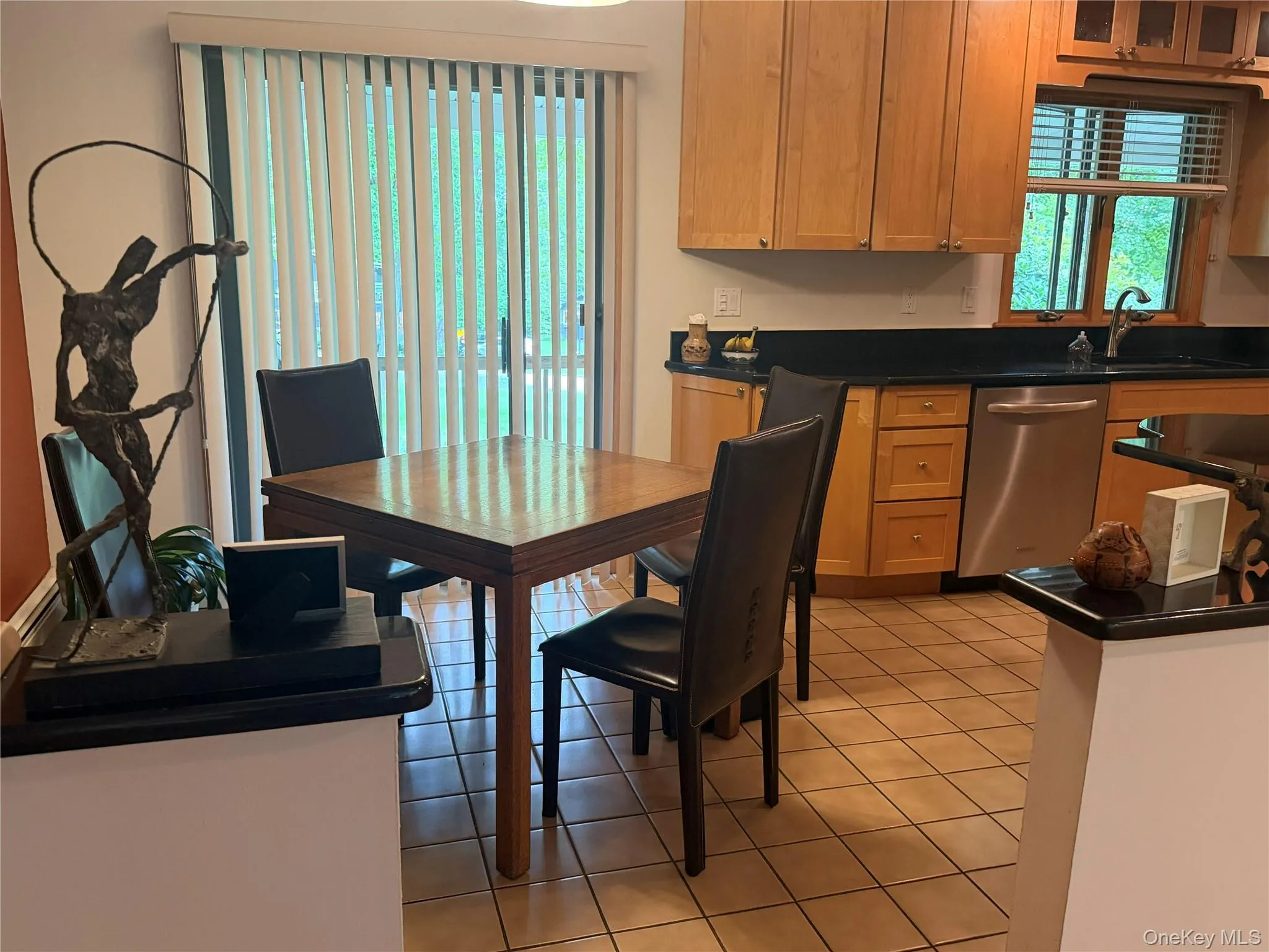 Dining Area with Sliding Glass door to Front Patio Dining Area with Sliding Glass door to Front Patio