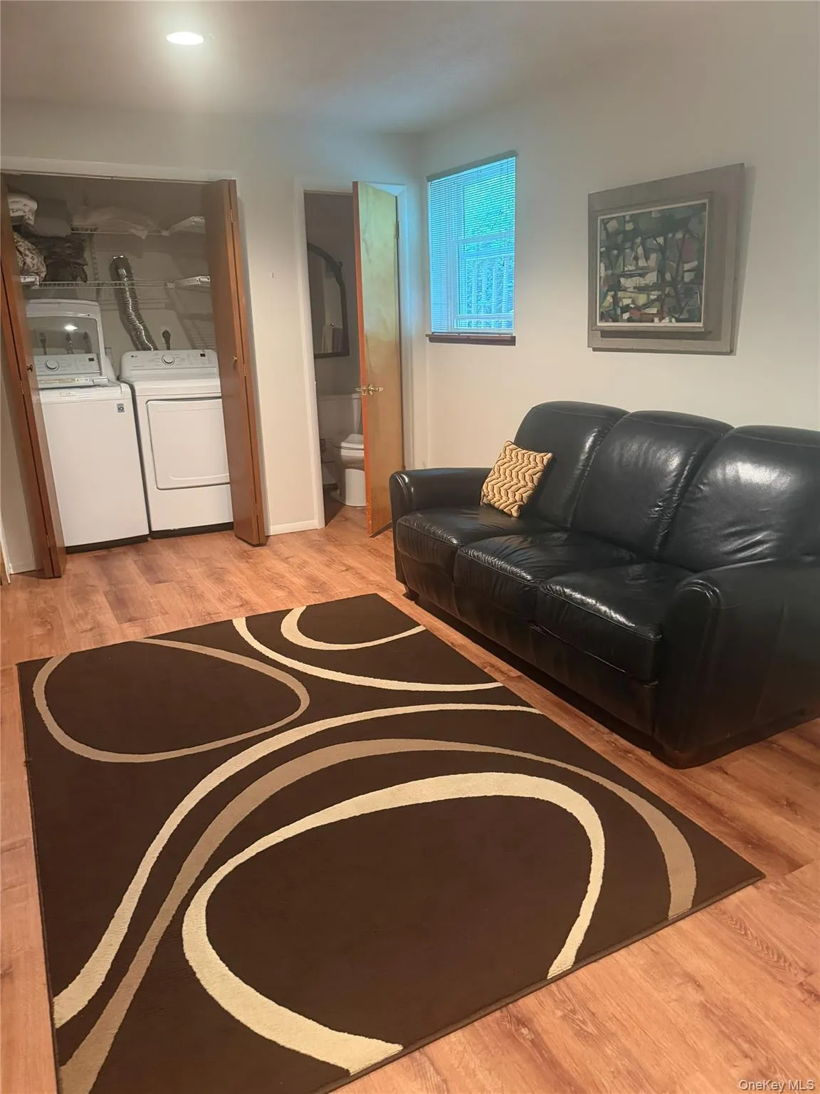 Family Room with .5 Bath and separate area for laundry--Washer and Dryer do stay Family Room with .5 Bath and separate area for laundry--Washer and Dryer do stay