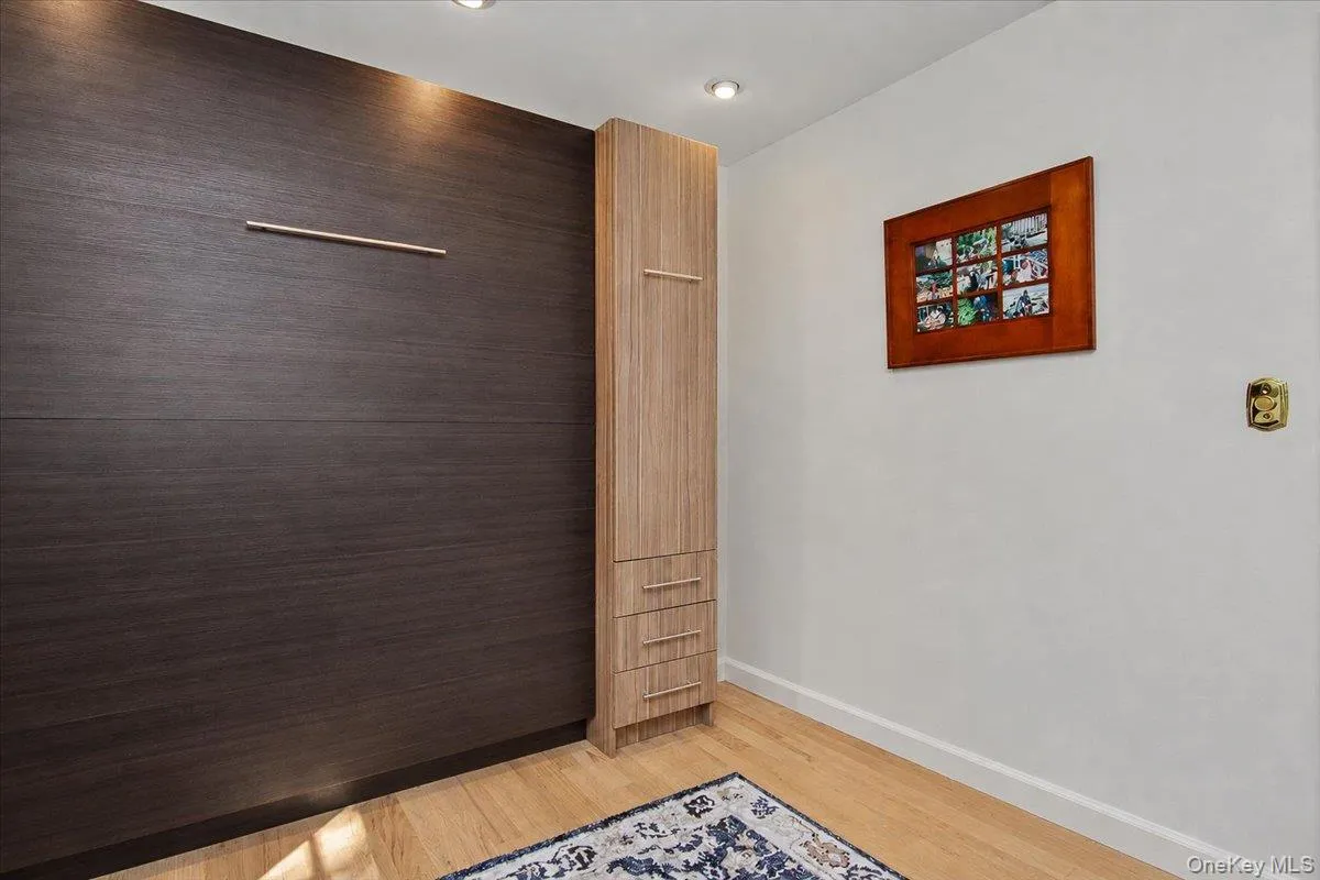 BEDROOM WITH BUILT-IN MURPHY BED BEDROOM WITH BUILT-IN MURPHY BED