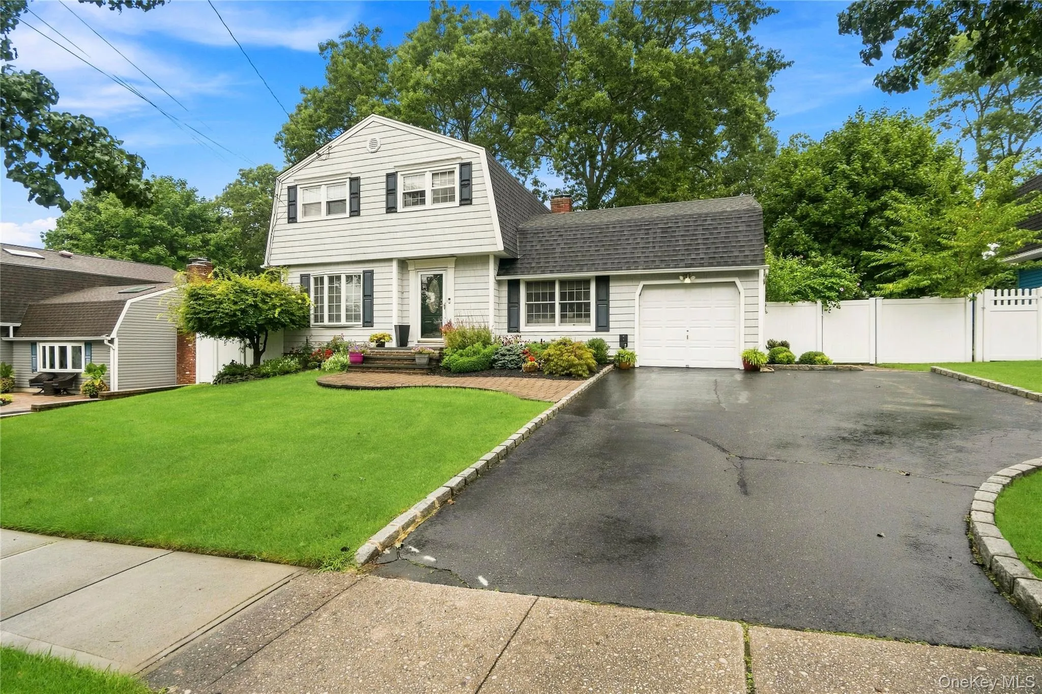 One car garage, 2 car blacktop driveway One car garage, 2 car blacktop driveway