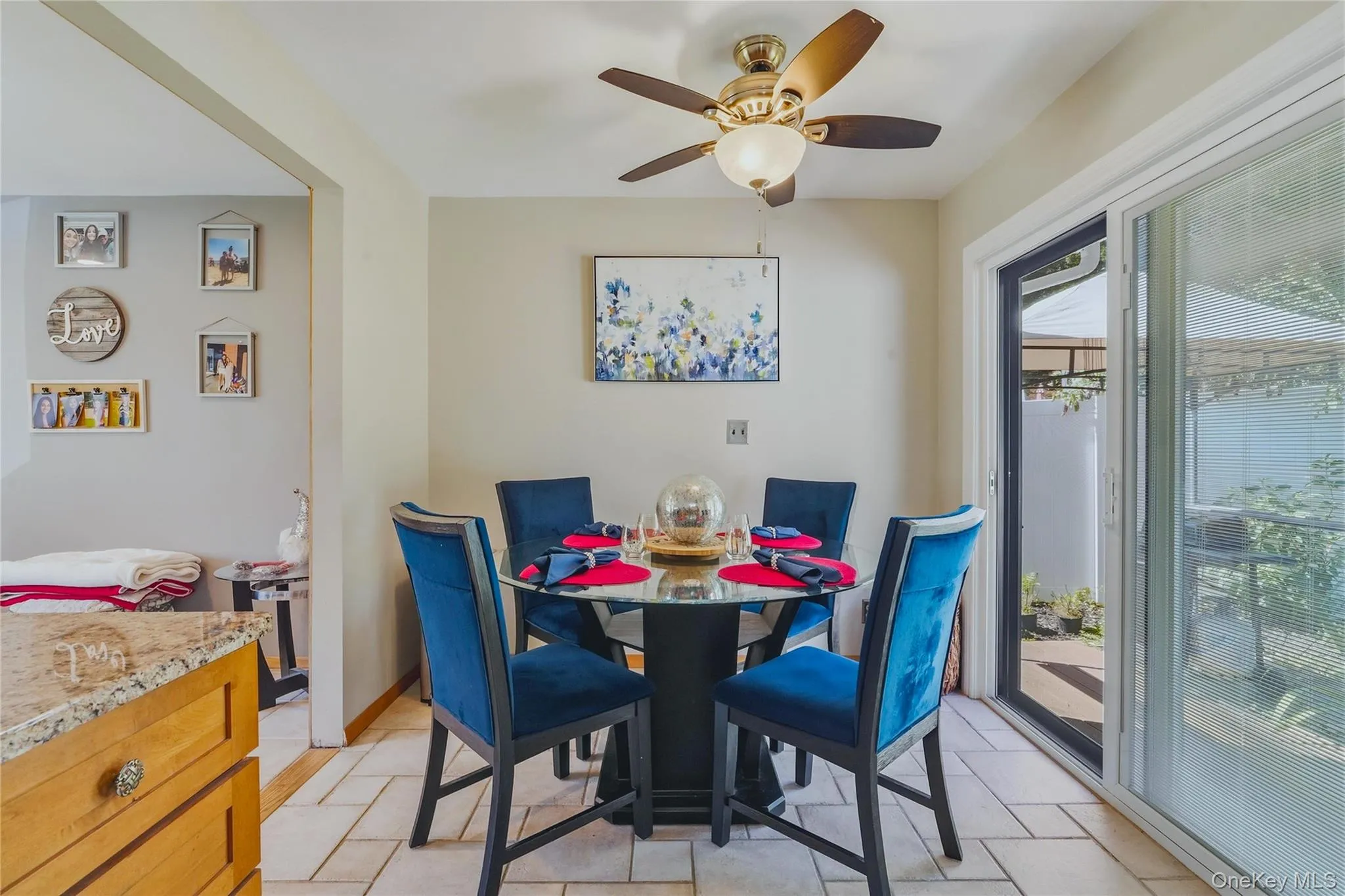 Eat in kitchen with ceiling fan with integrated lighting, and a glass sliding door to your very own piece of peace! Eat in kitchen with ceiling fan with integrated lighting, and a glass sliding door to your very own piece of peace!