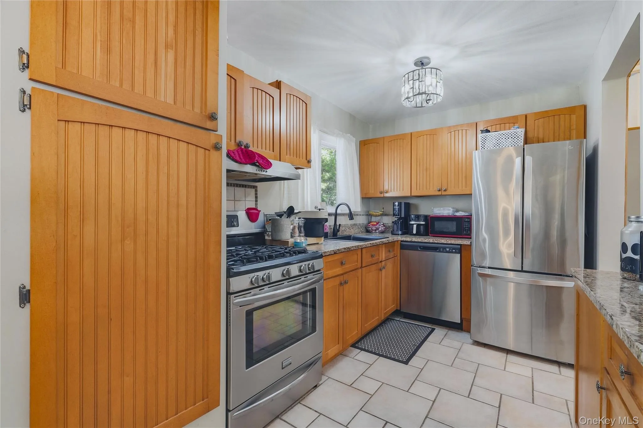 Kitchen featuring stainless steel appliances. Kitchen featuring stainless steel appliances.