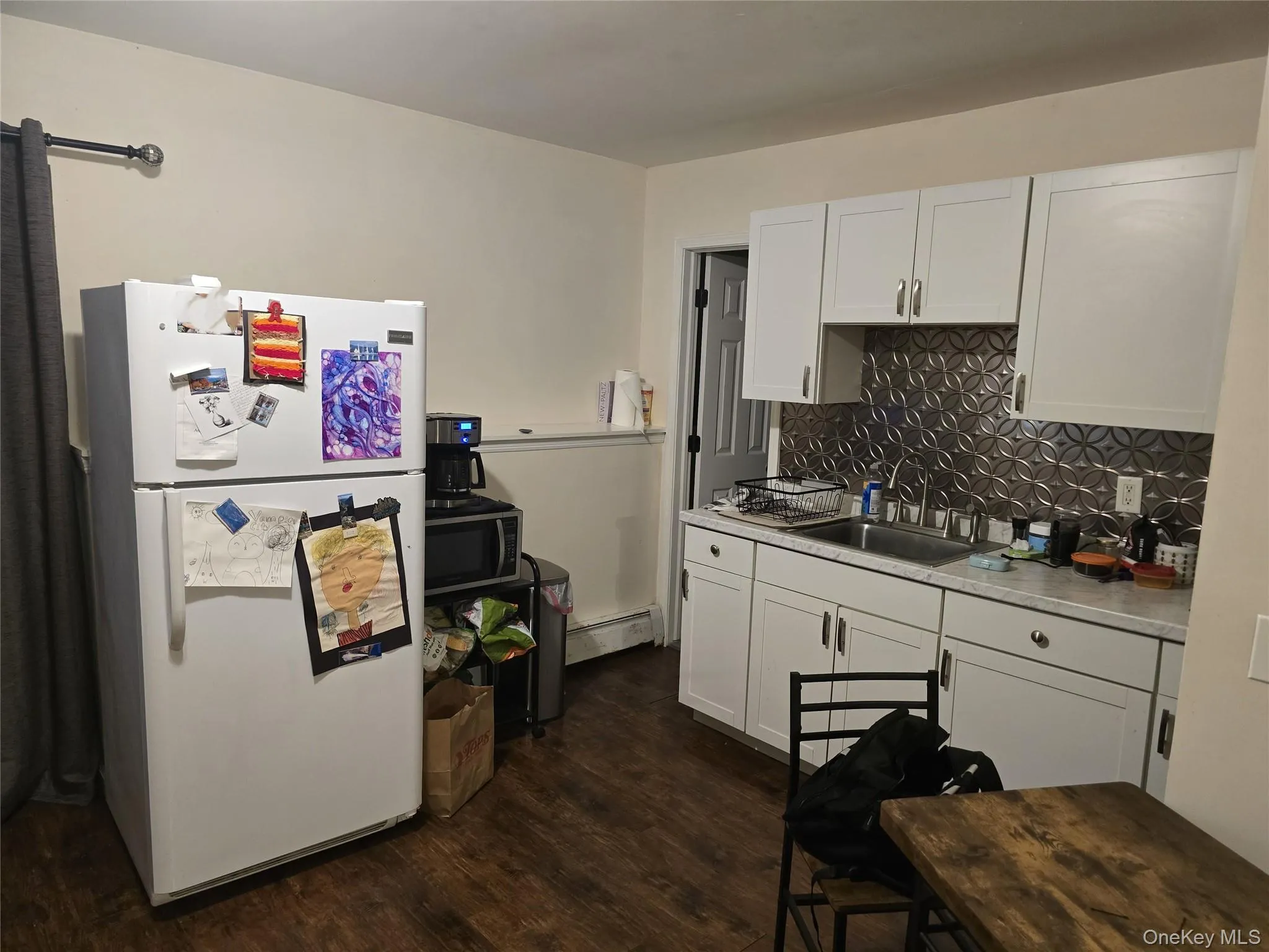 Downstairs, with mother daughter potential, refrigerator, stove top and sink. Downstairs, with mother daughter potential, refrigerator, stove top and sink.