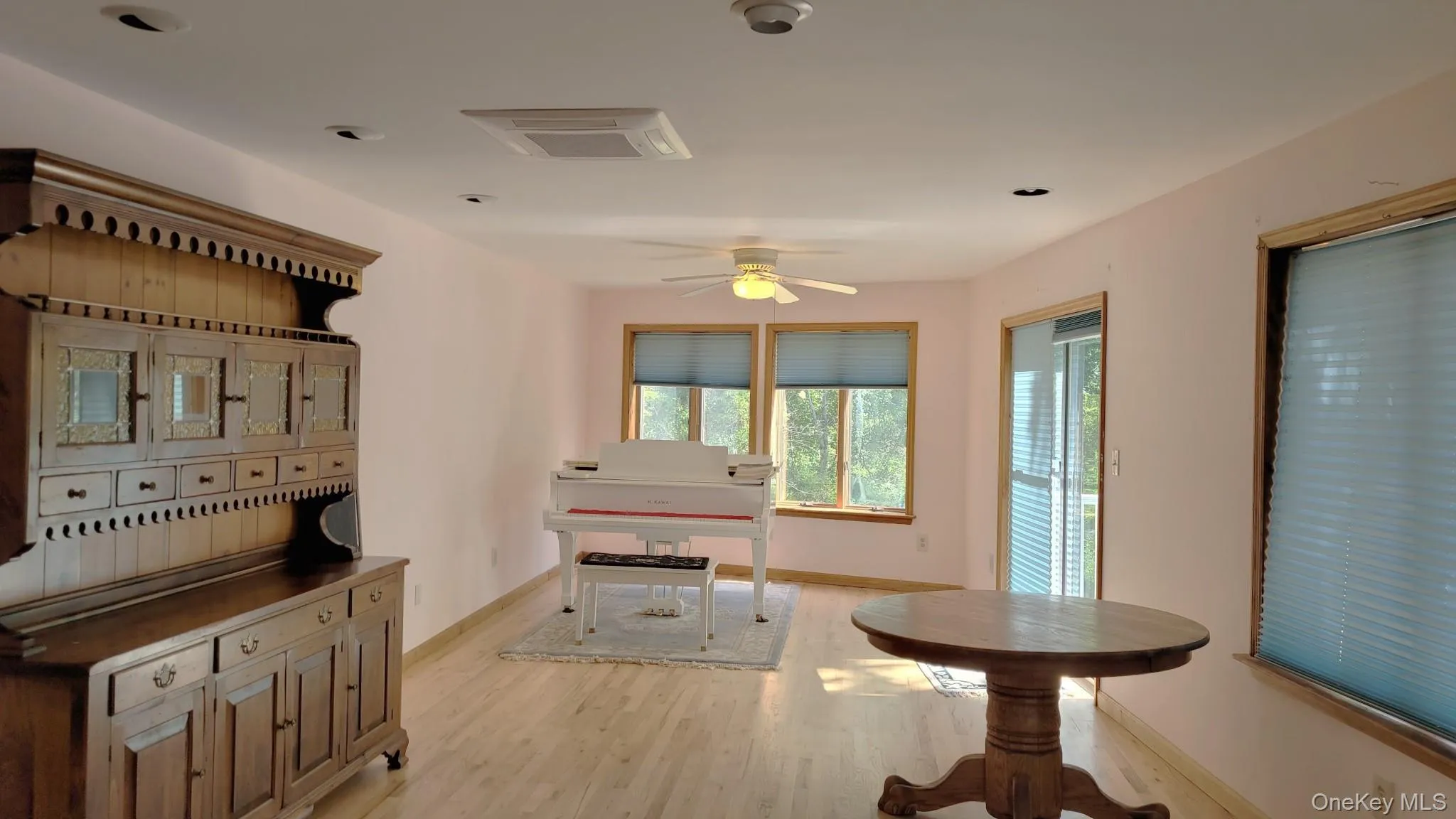 Large room with many windows and recessed lighting Large room with many windows and recessed lighting