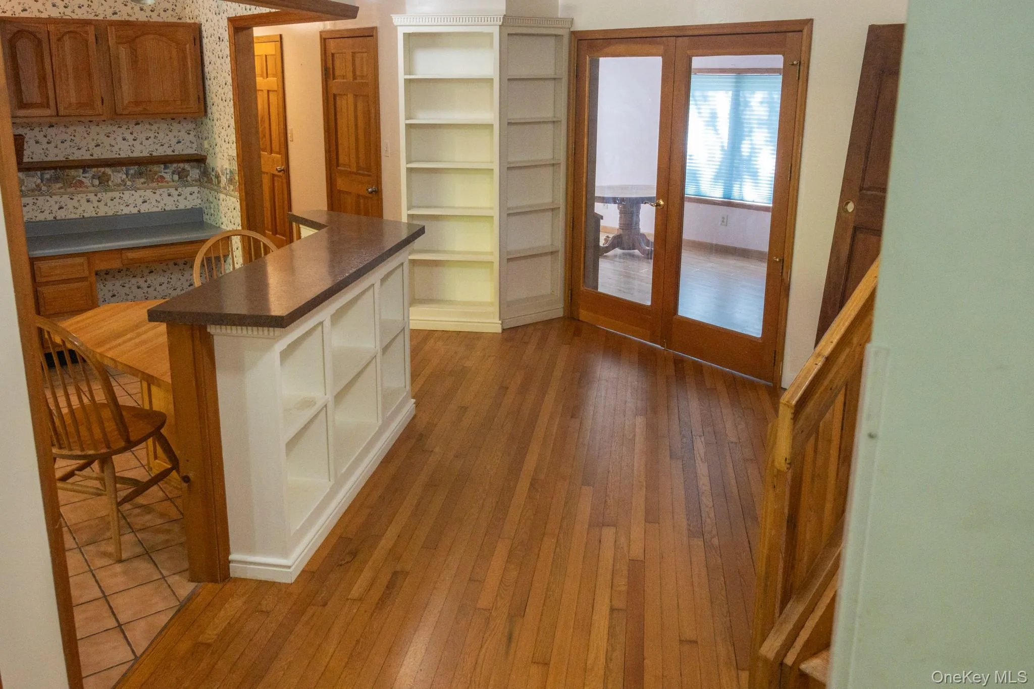 The hallway from the entryway provides access to various areas of the house. Along the way are many closets. The hallway from the entryway provides access to various areas of the house. Along the way are many closets.