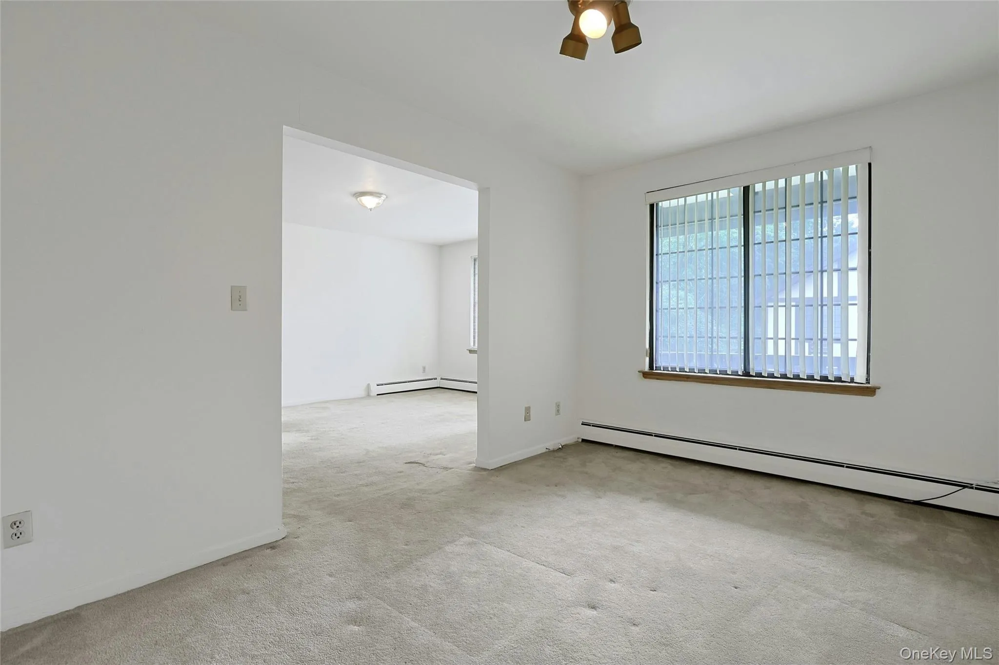 Entrance from living room to dining room Entrance from living room to dining room