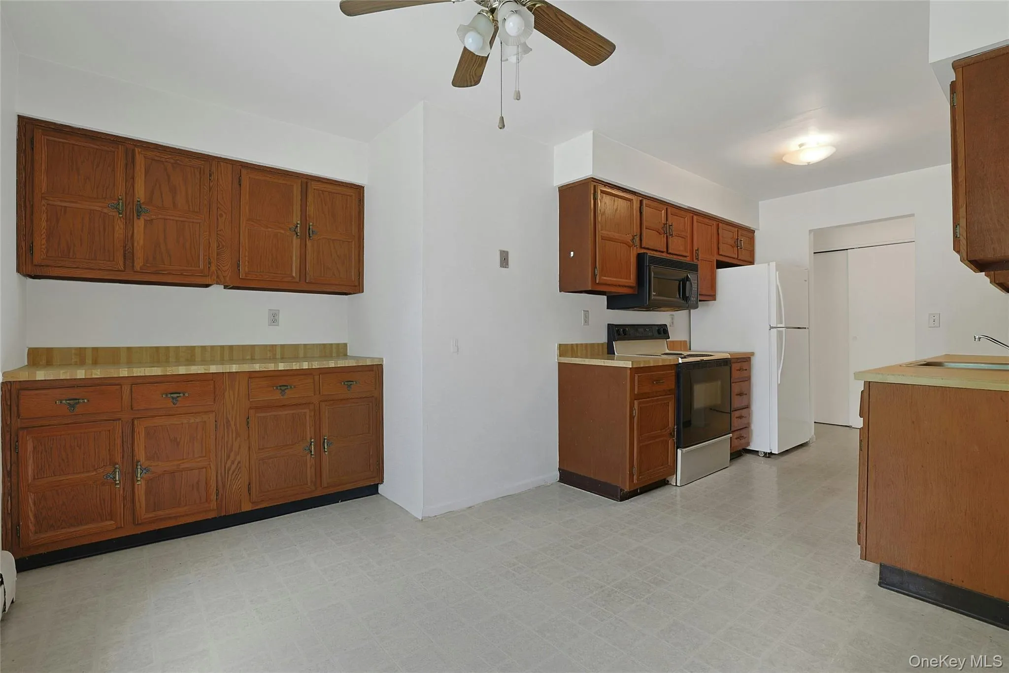 Dining area in kitchen with extra cabinets Dining area in kitchen with extra cabinets