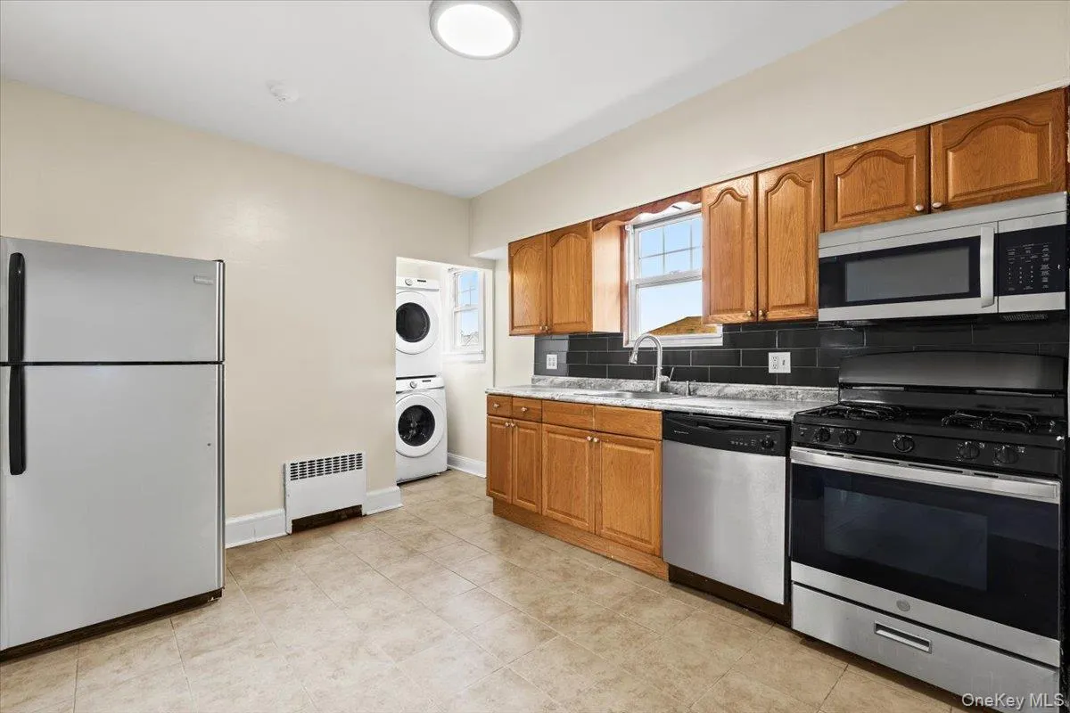 Full size, stackable washer/dryer in the unit Full size, stackable washer/dryer in the unit