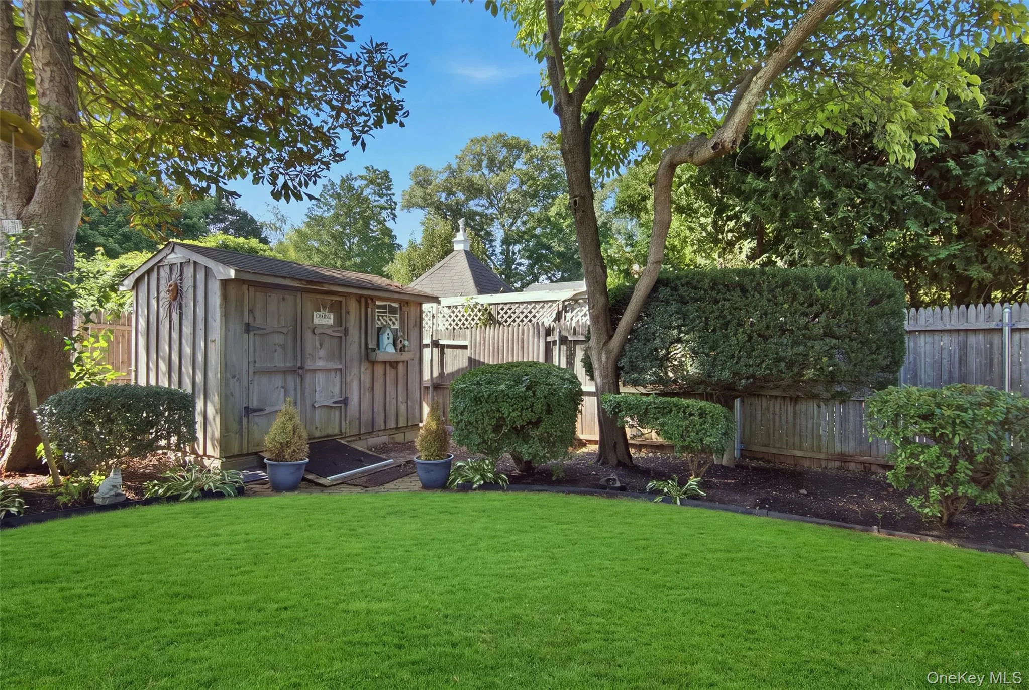 Step out to your private back yard with patio, grass, gardens and 2 storage sheds. Step out to your private back yard with patio, grass, gardens and 2 storage sheds.