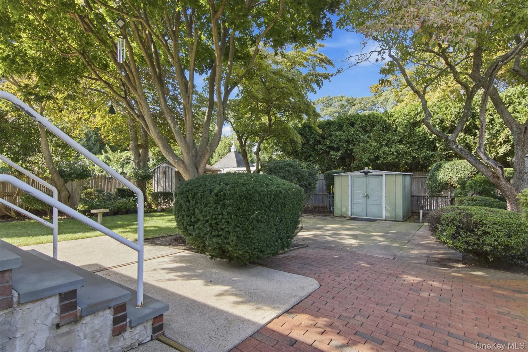 Step out to your private back yard with patio, grass, gardens and 2 storage sheds. Step out to your private back yard with patio, grass, gardens and 2 storage sheds.
