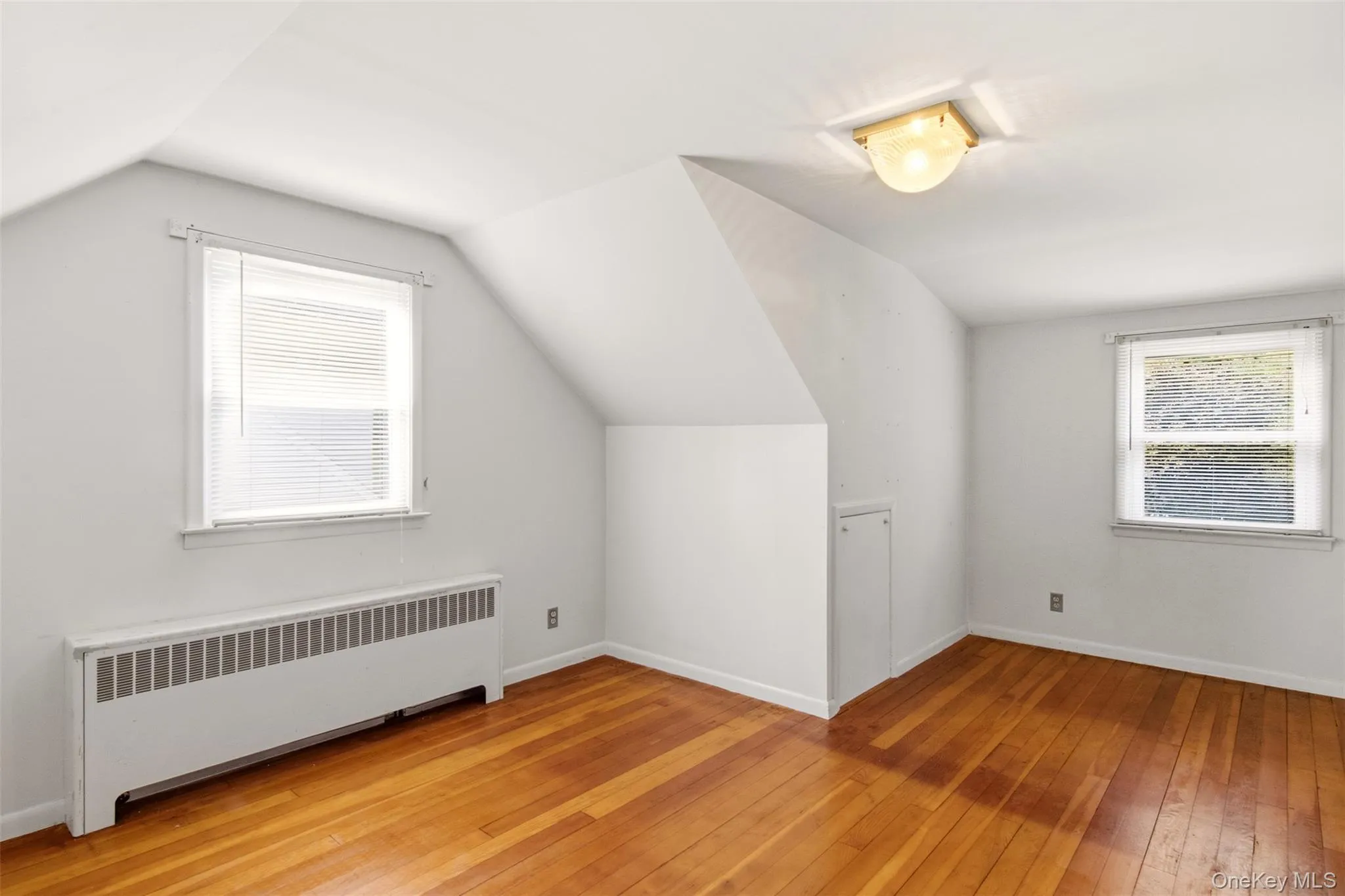 Second floor bedroom 3 with hardwood floors. Second floor bedroom 3 with hardwood floors.