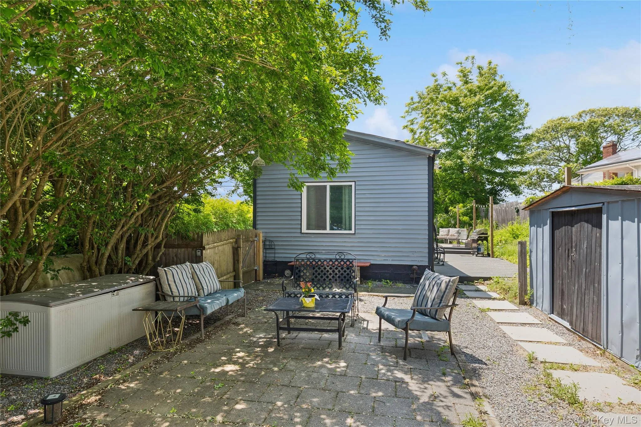 View of patio / terrace with a storage shed View of patio / terrace with a storage shed