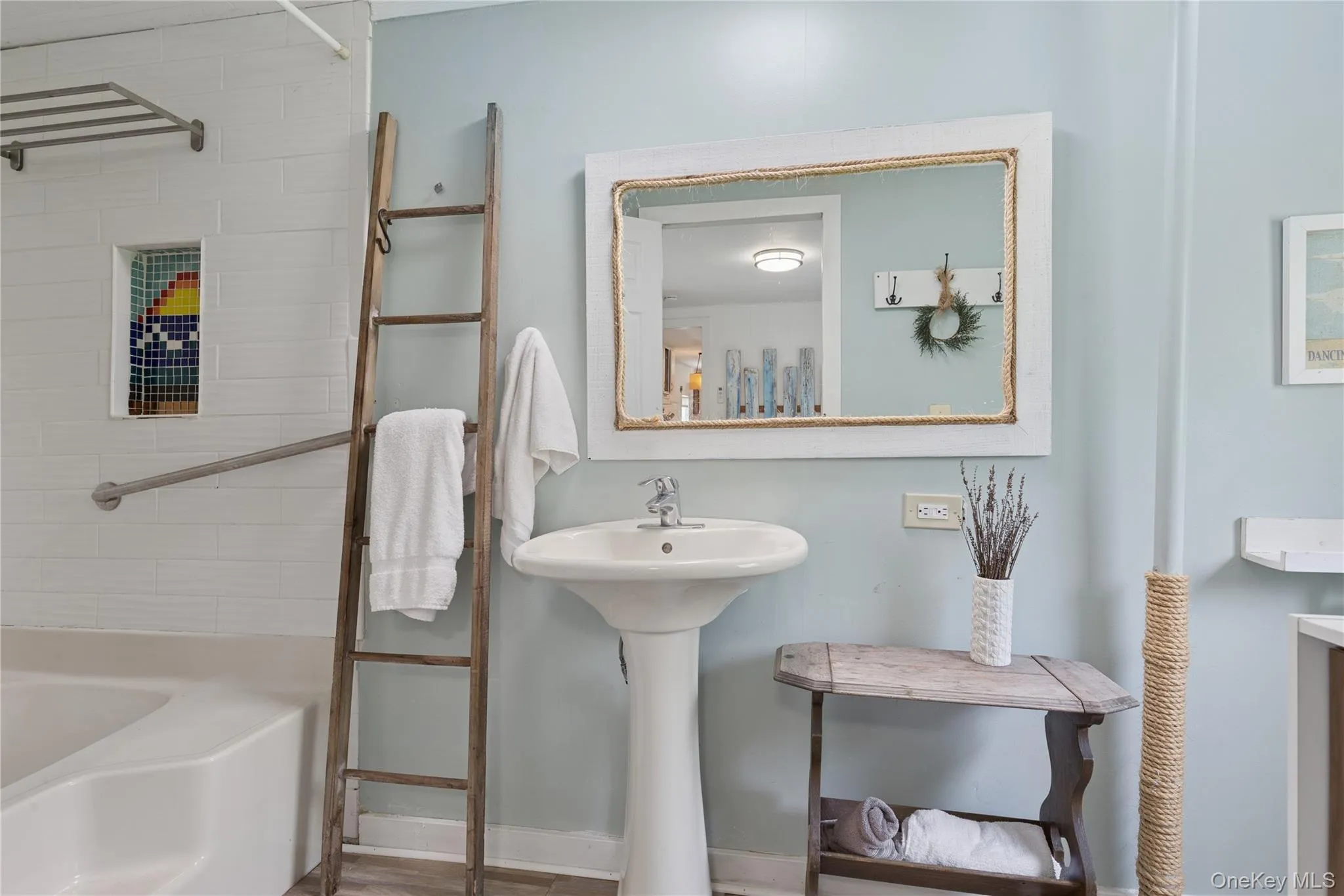 Full bath with baseboards and shower / tub combination Full bath with baseboards and shower / tub combination