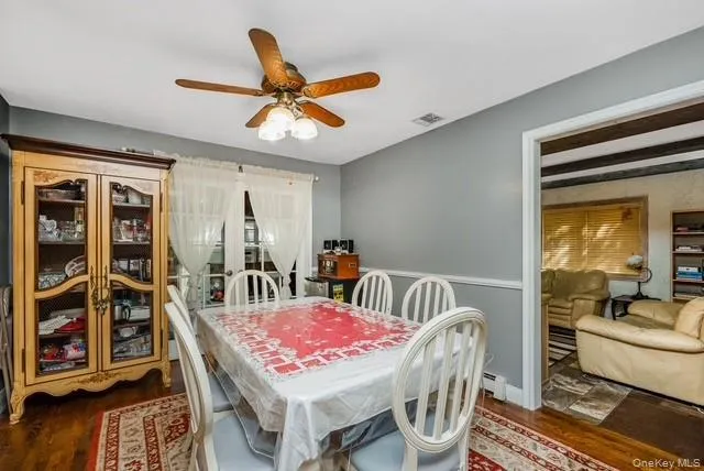 Dining Room flows into Family Room which has Fireplace Dining Room flows into Family Room which has Fireplace