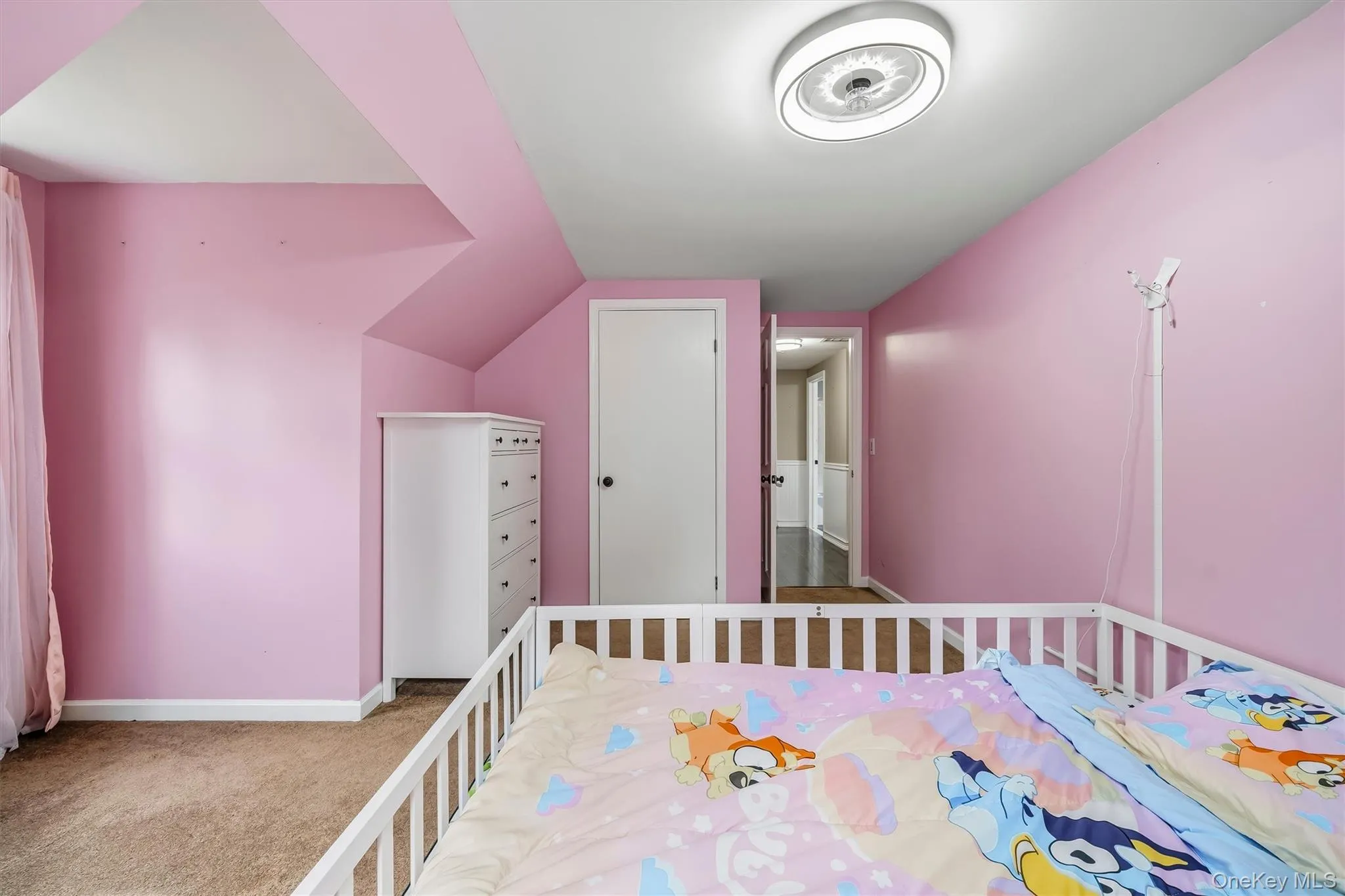Bright bedroom with a spacious layout, closet, and carpeted flooring. Bright bedroom with a spacious layout, closet, and carpeted flooring.