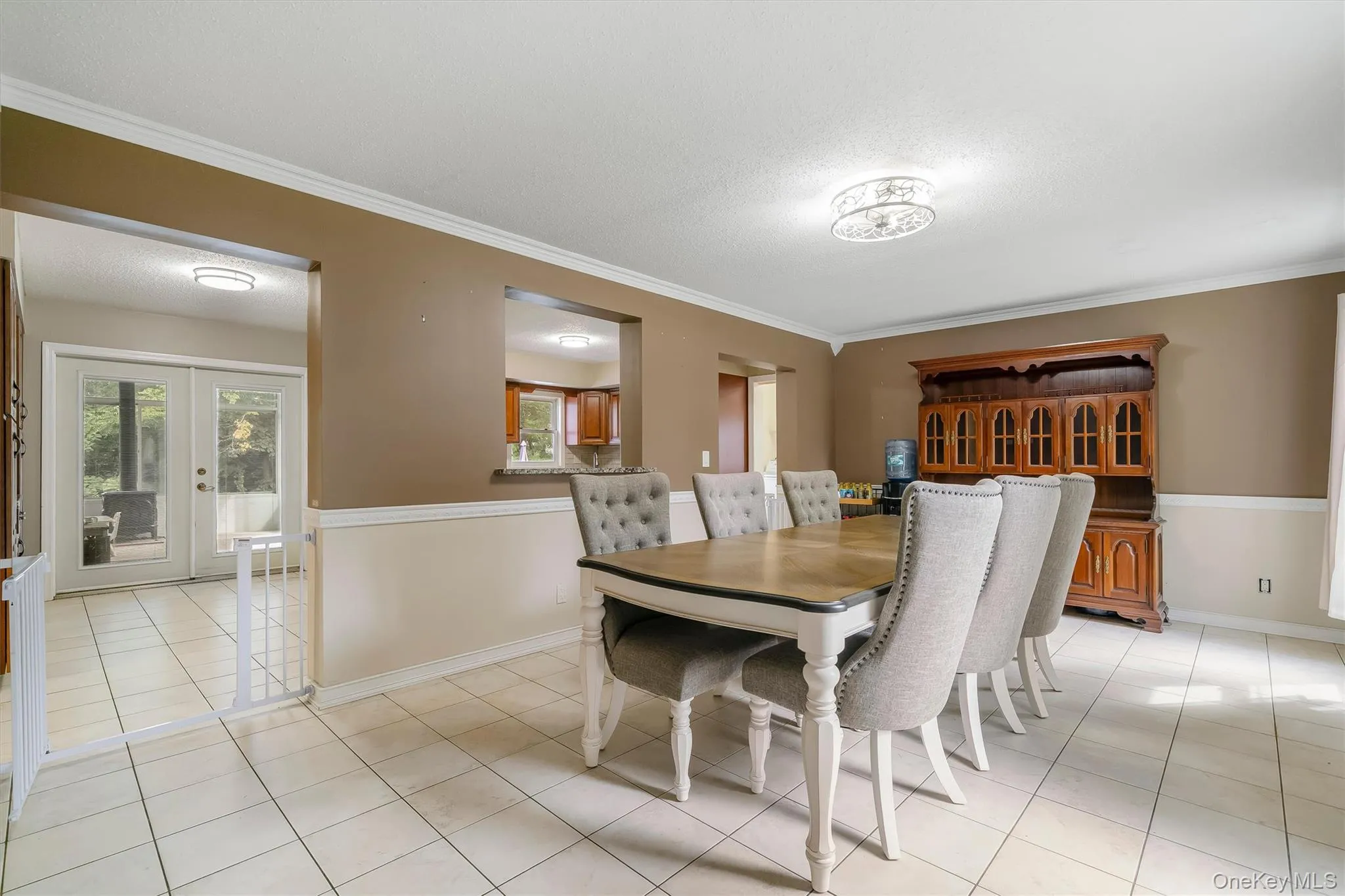 Additional view of the dining area with access to the kitchen and adjoining living spaces. Additional view of the dining area with access to the kitchen and adjoining living spaces.