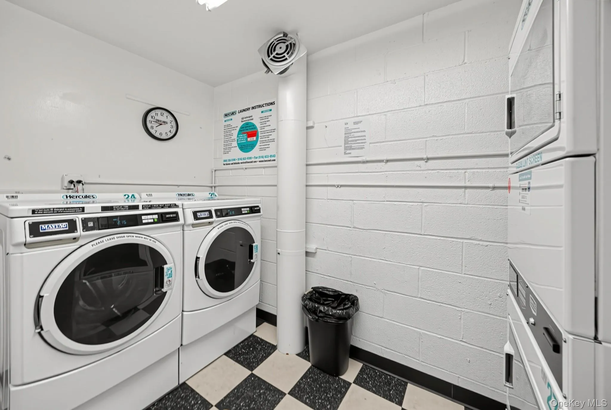 The same-floor laundry room includes multiple washers and dryers for residents’ use. The same-floor laundry room includes multiple washers and dryers for residents’ use.