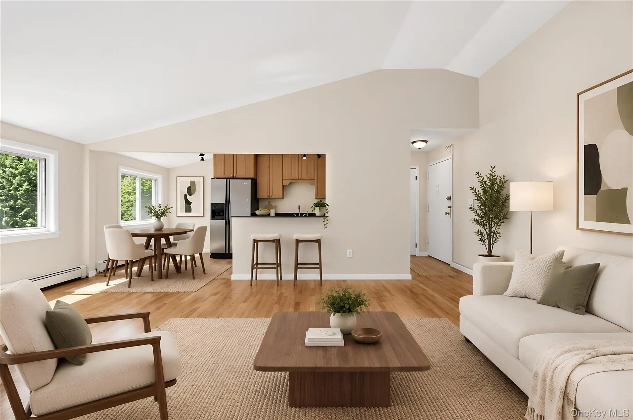 Virtually staged to showcase the spacious living area, soaring ceilings and open connection to the kitchen. Virtually staged to showcase the spacious living area, soaring ceilings and open connection to the kitchen.