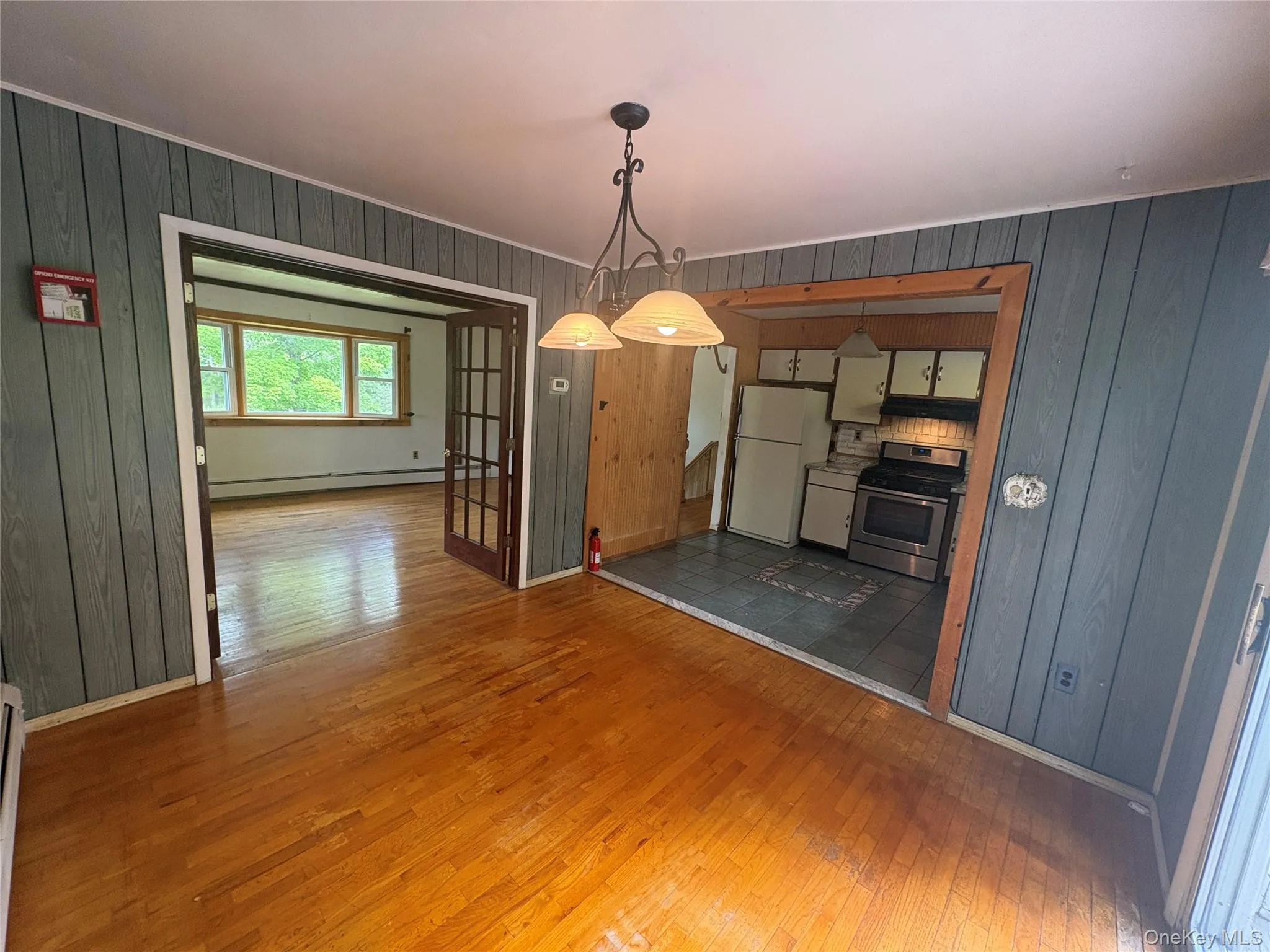 Dining area with hardwood floors, open to the kitchen Dining area with hardwood floors, open to the kitchen