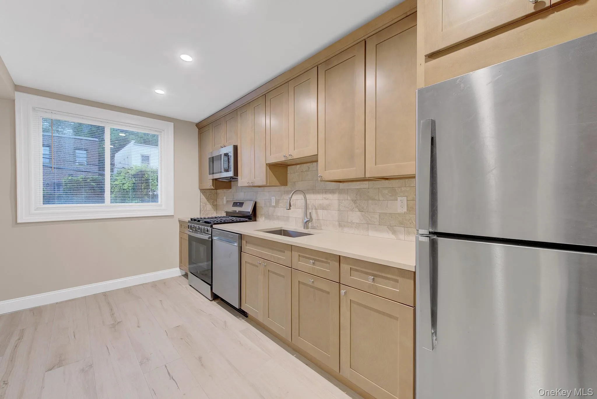 Newly renovated kitchen with stainless appliances Newly renovated kitchen with stainless appliances