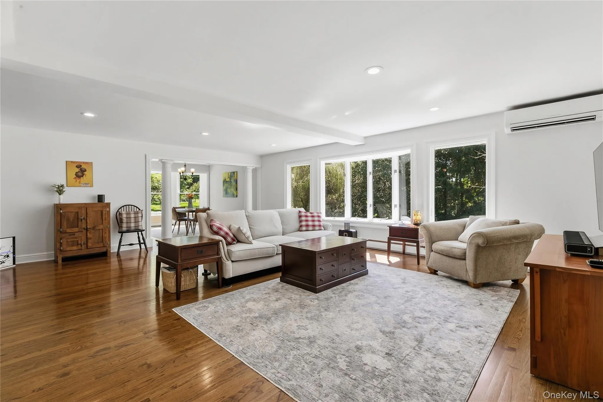 Open airy living room with phenomenal natural light. Open airy living room with phenomenal natural light.