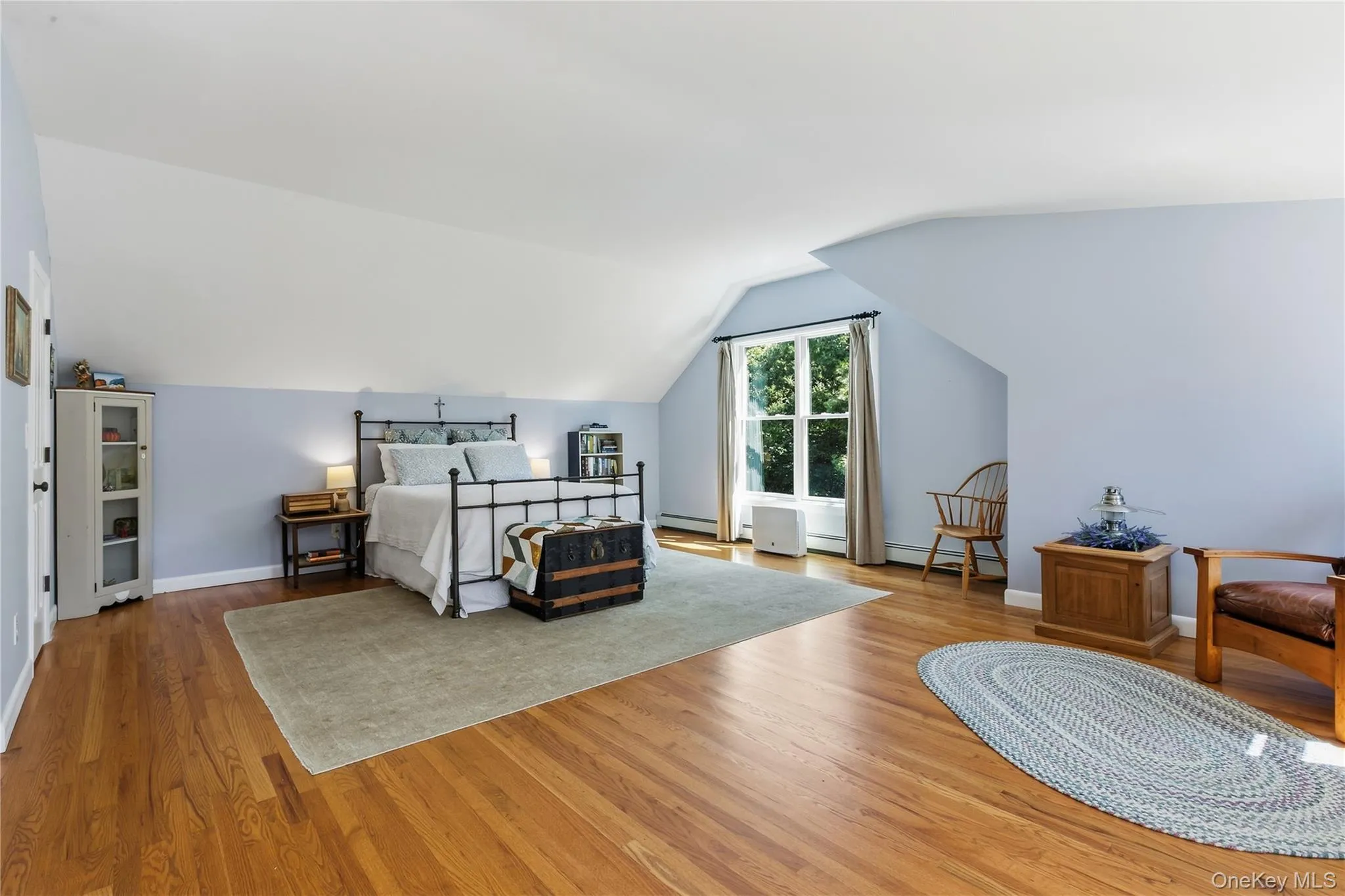 Second bedroom being used as a primary bedroom. Second bedroom being used as a primary bedroom.