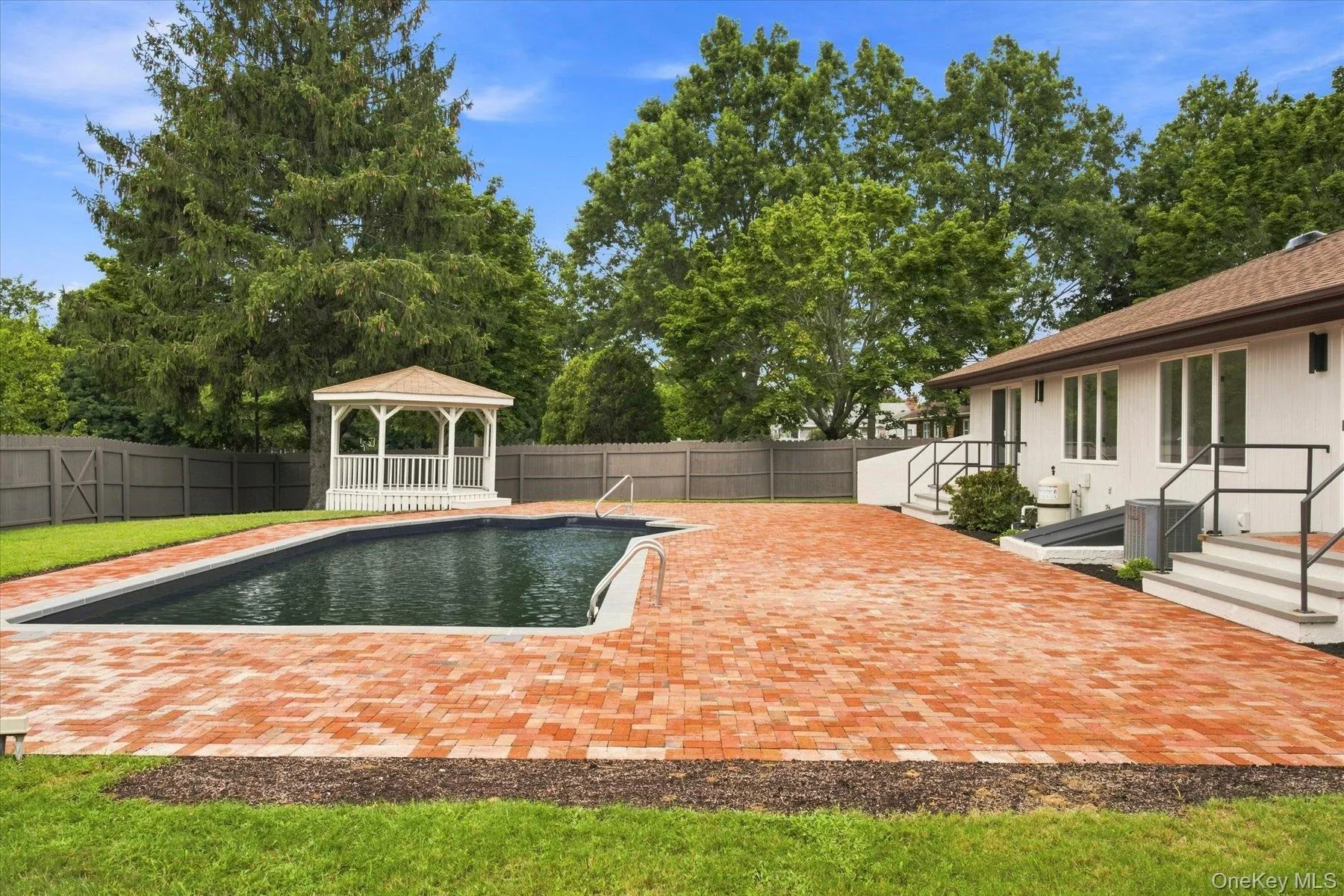 Beautiful backyard setting with in-ground pool Beautiful backyard setting with in-ground pool