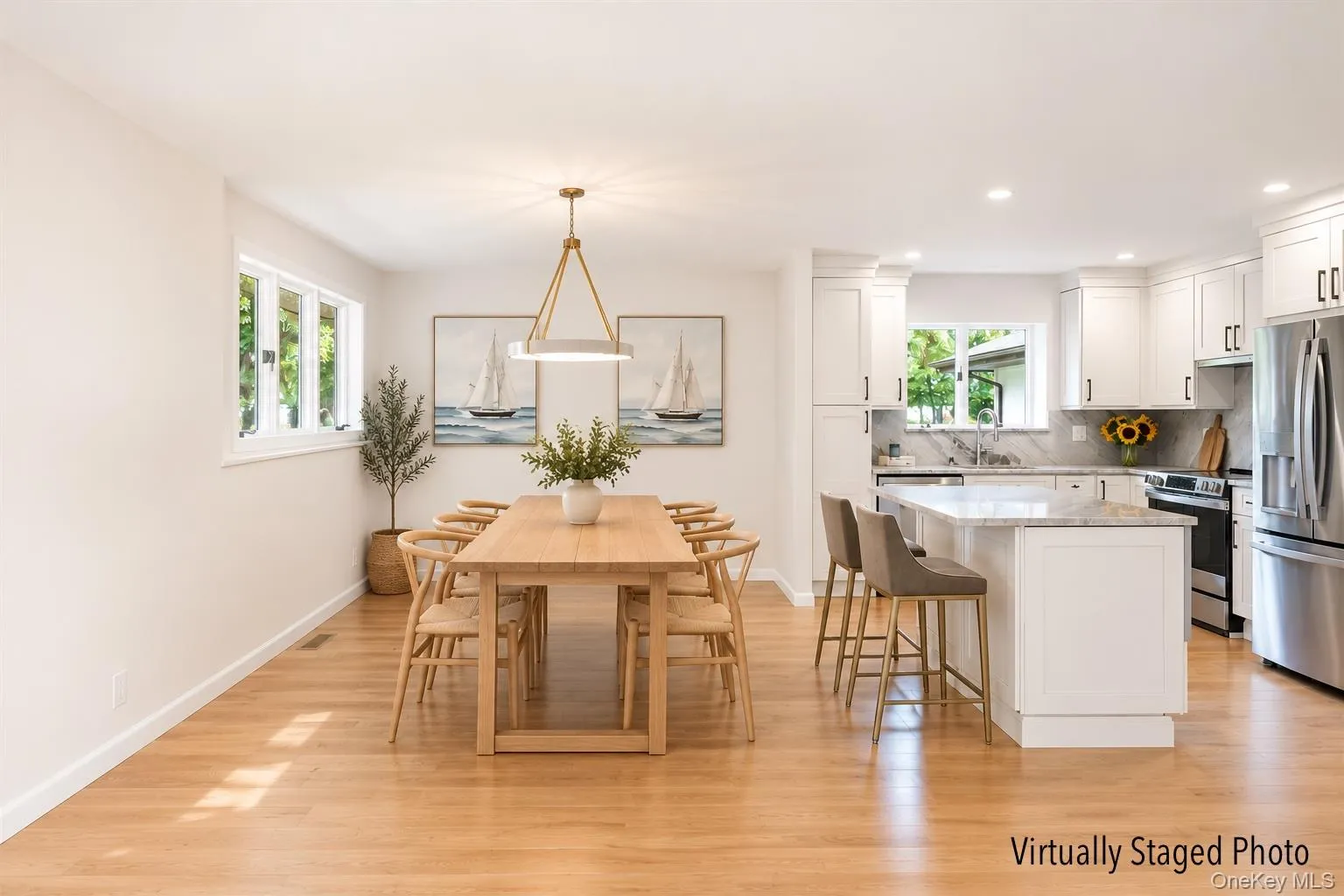 Virtually staged open concept living area to kitchen Virtually staged open concept living area to kitchen